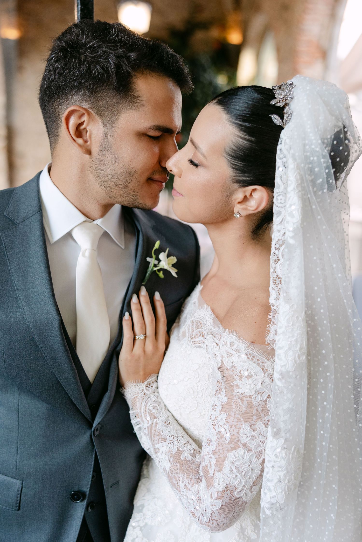 Romantic wedding portrait sequence showing tender moments between newlyweds in formal attire.