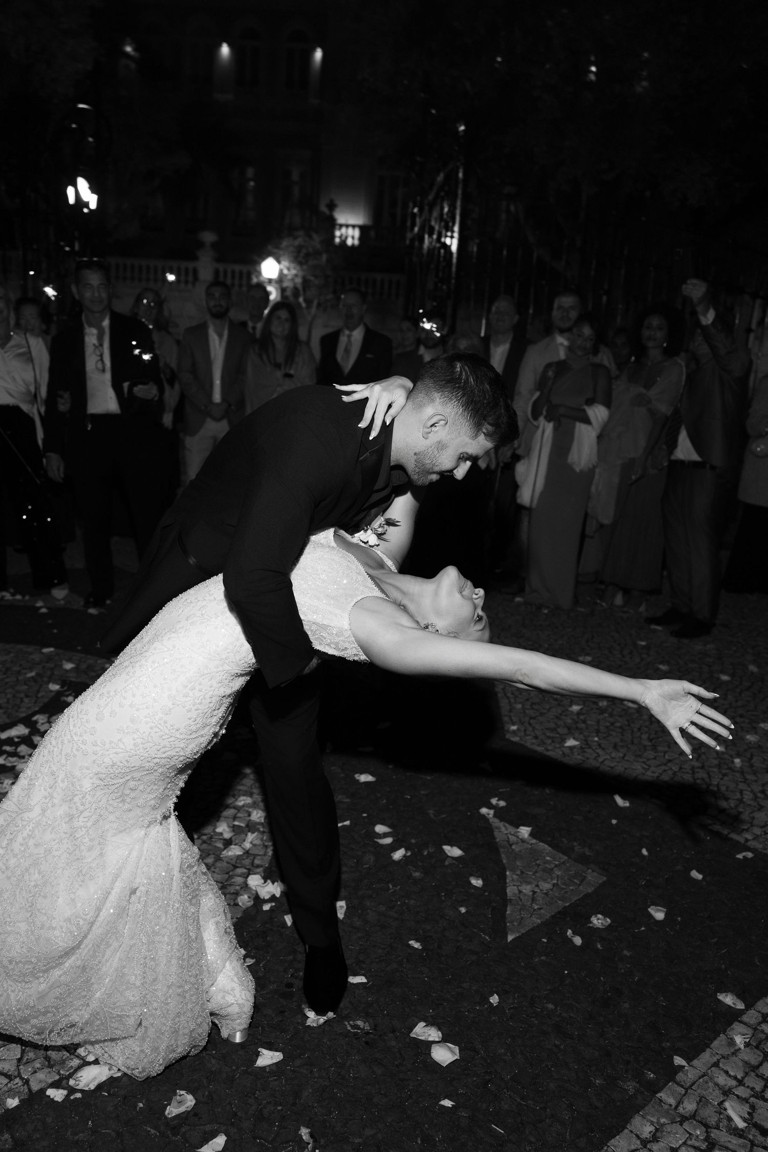 Dancing couple performs romantic moves on their wedding night dance floor.