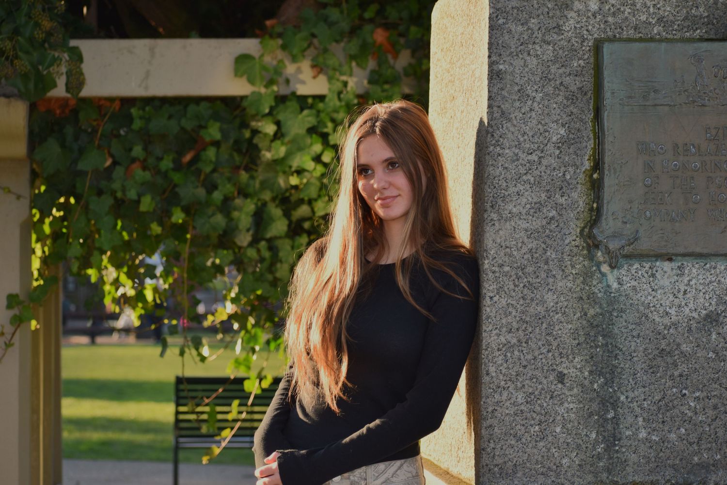 Senior portrait with golden hour lighting in Pierce County