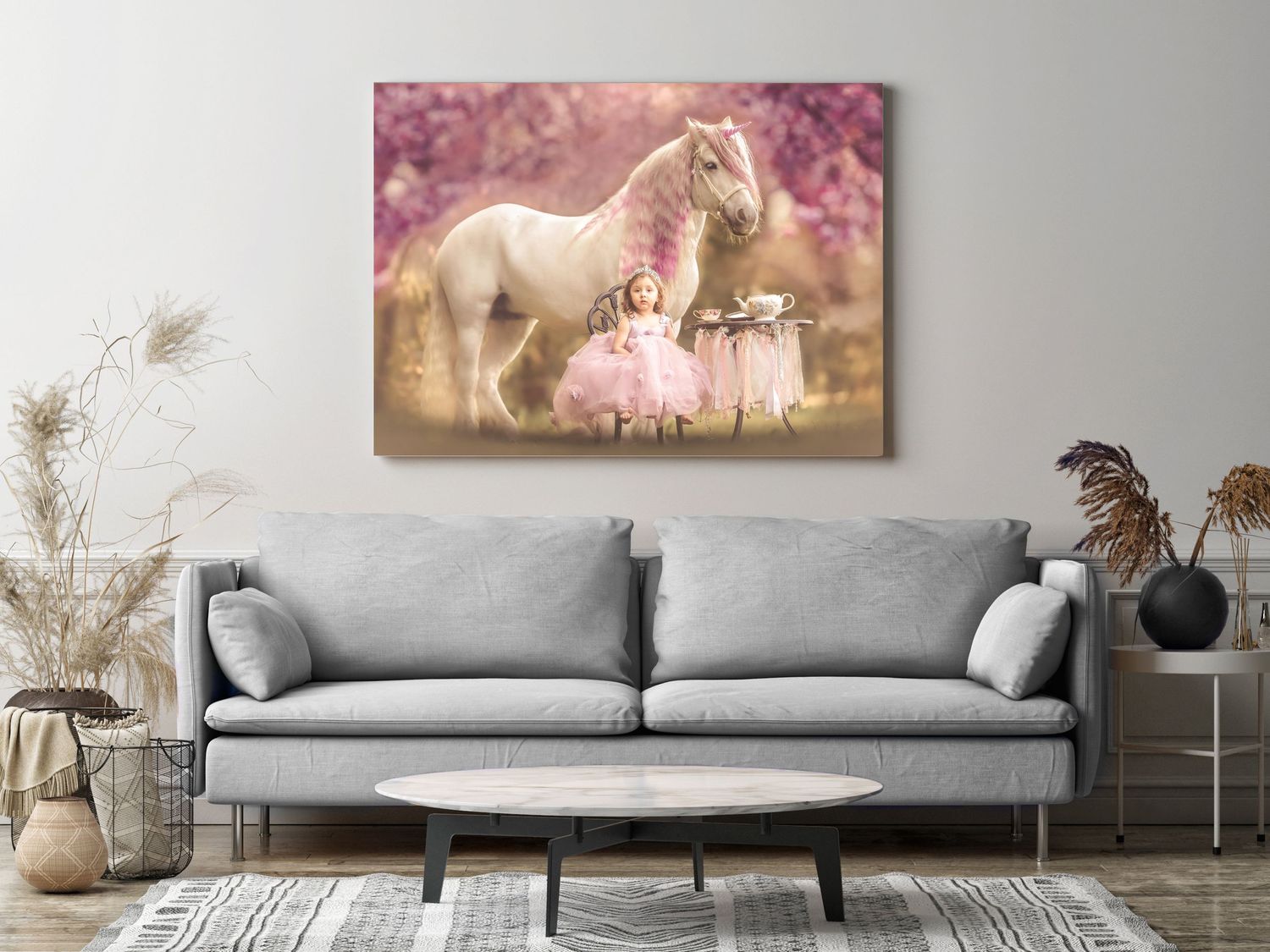 A little girl in a pink tutu stands beside a white horse among pink blossoms in a dreamy canvas wall art.