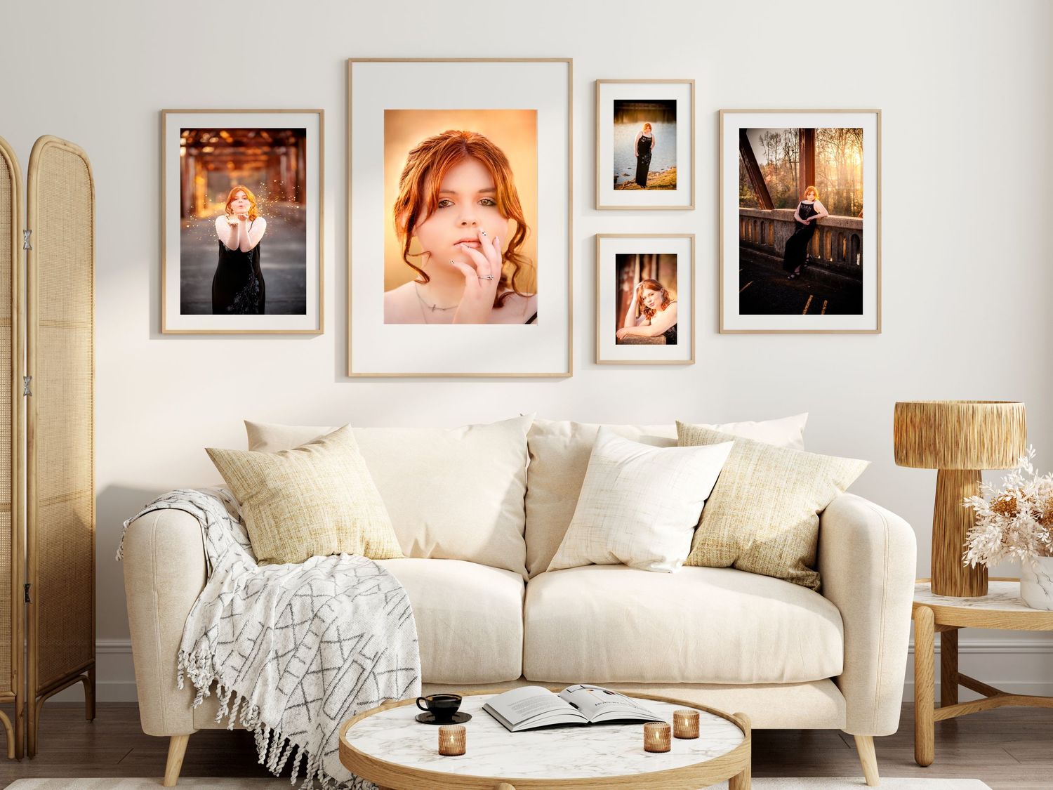 A cozy living room with a beige sofa, gallery wall of warm-toned portrait photos, and a round wooden coffee table.