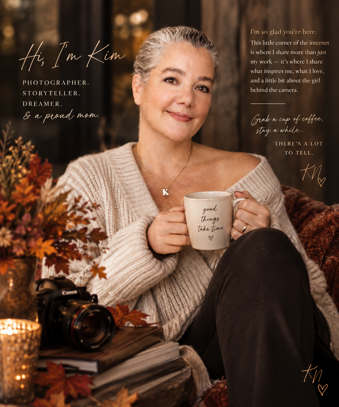Woman named Kim, photographer and storyteller, smiling warmly holding a mug in a cozy autumn-themed portrait setting.