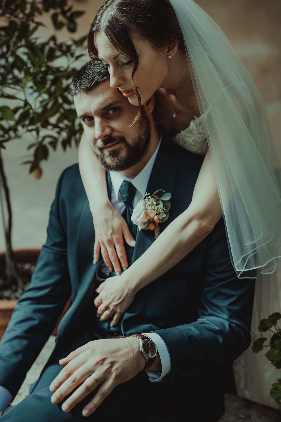 Close-up artistic wedding photography showing tender moments between newlyweds.