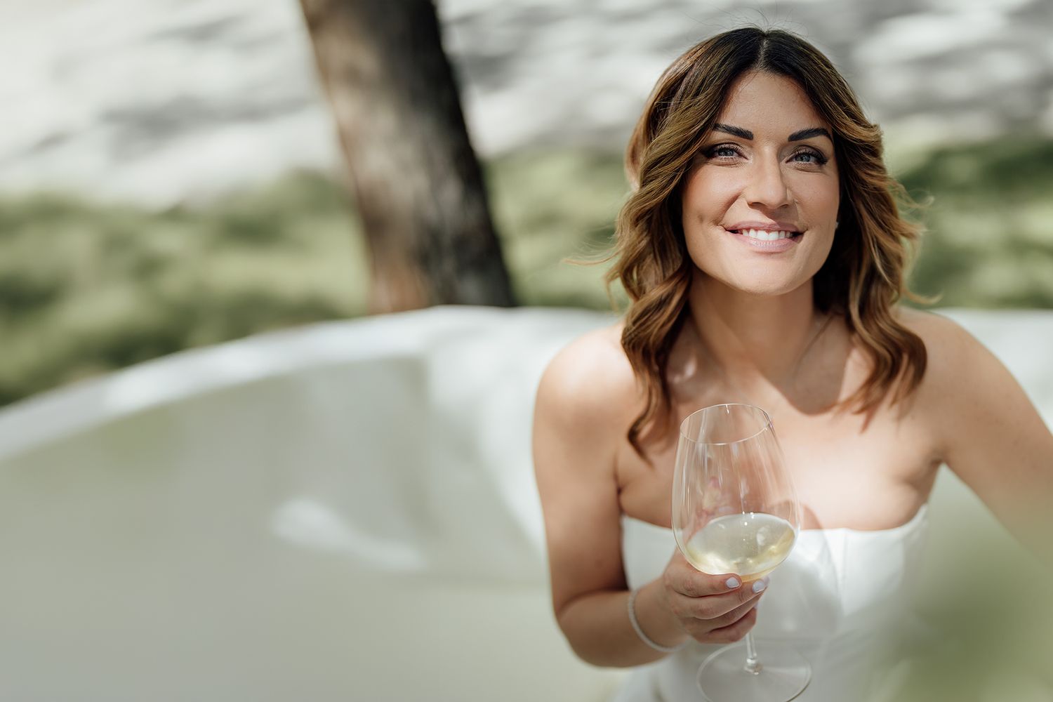 Joyful moments captured during an outdoor wedding celebration.