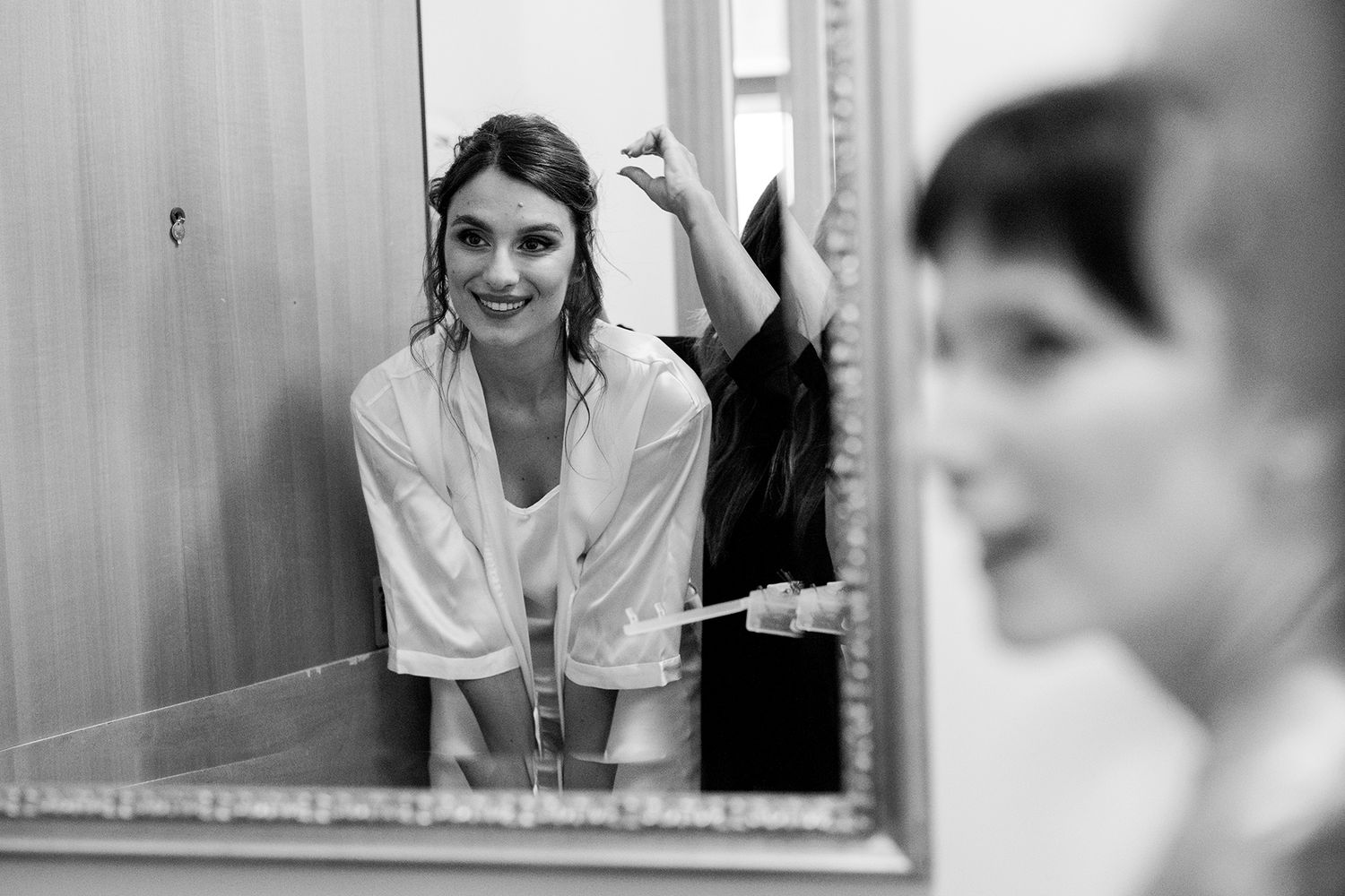Black and white sequence showing reflections in a mirror with natural light.
