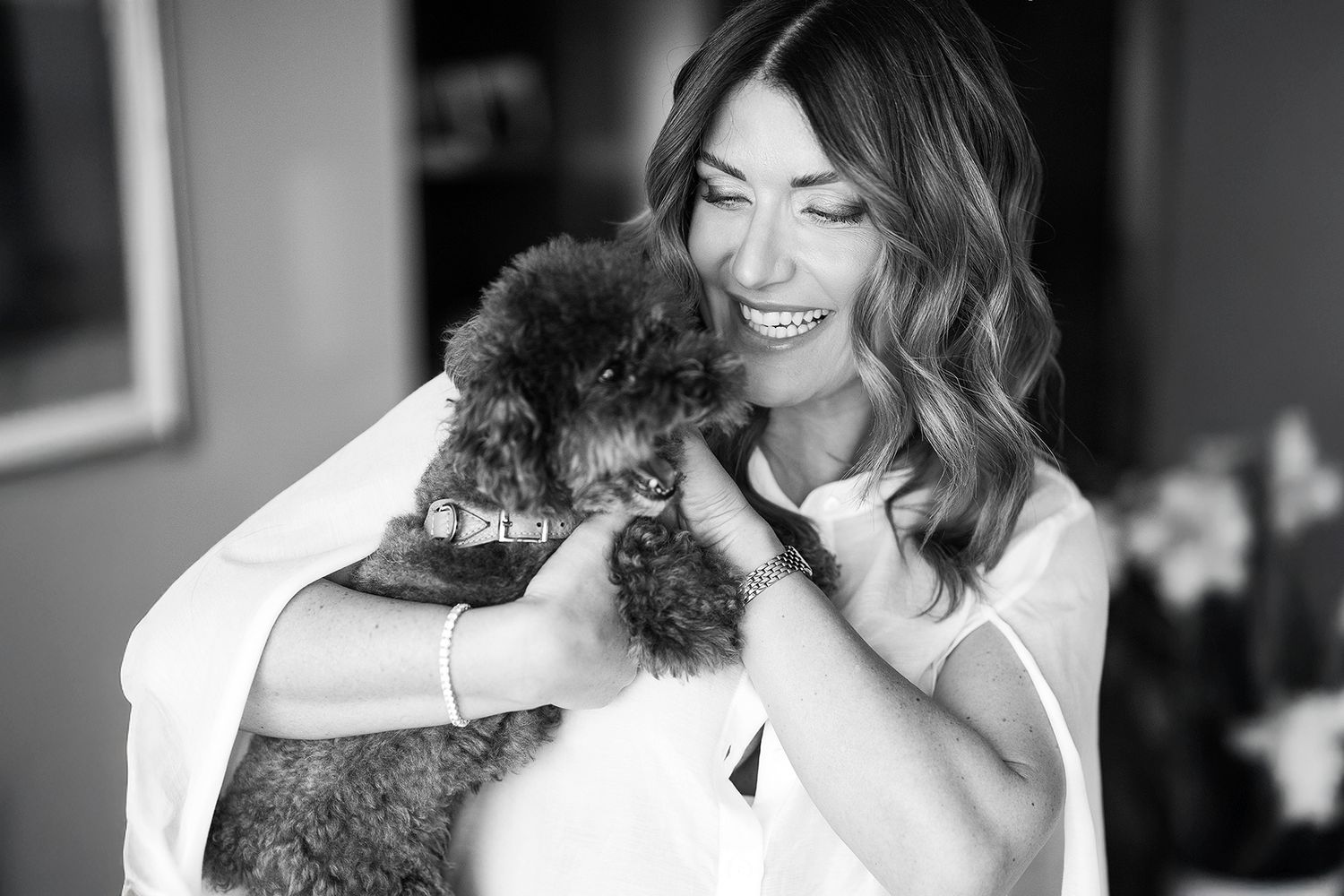 Black and white candid portraits showing natural expressions and laughter.