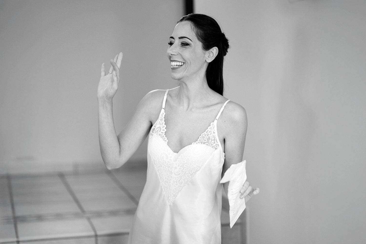 Black and white portrait series showing joyful expressions and gestures.