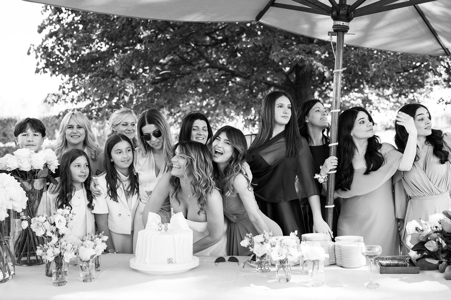 Black and white photo series capturing candid wedding celebration moments.