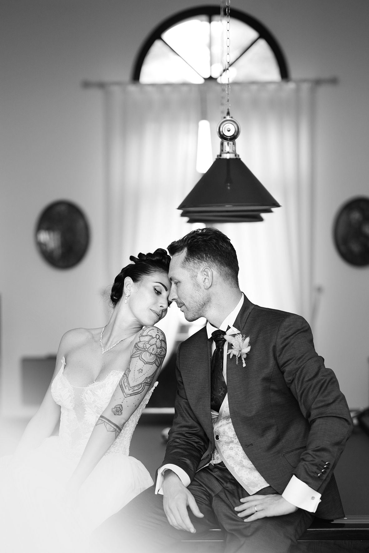 Romantic black and white wedding portraits captured in sequence showing tender moments.