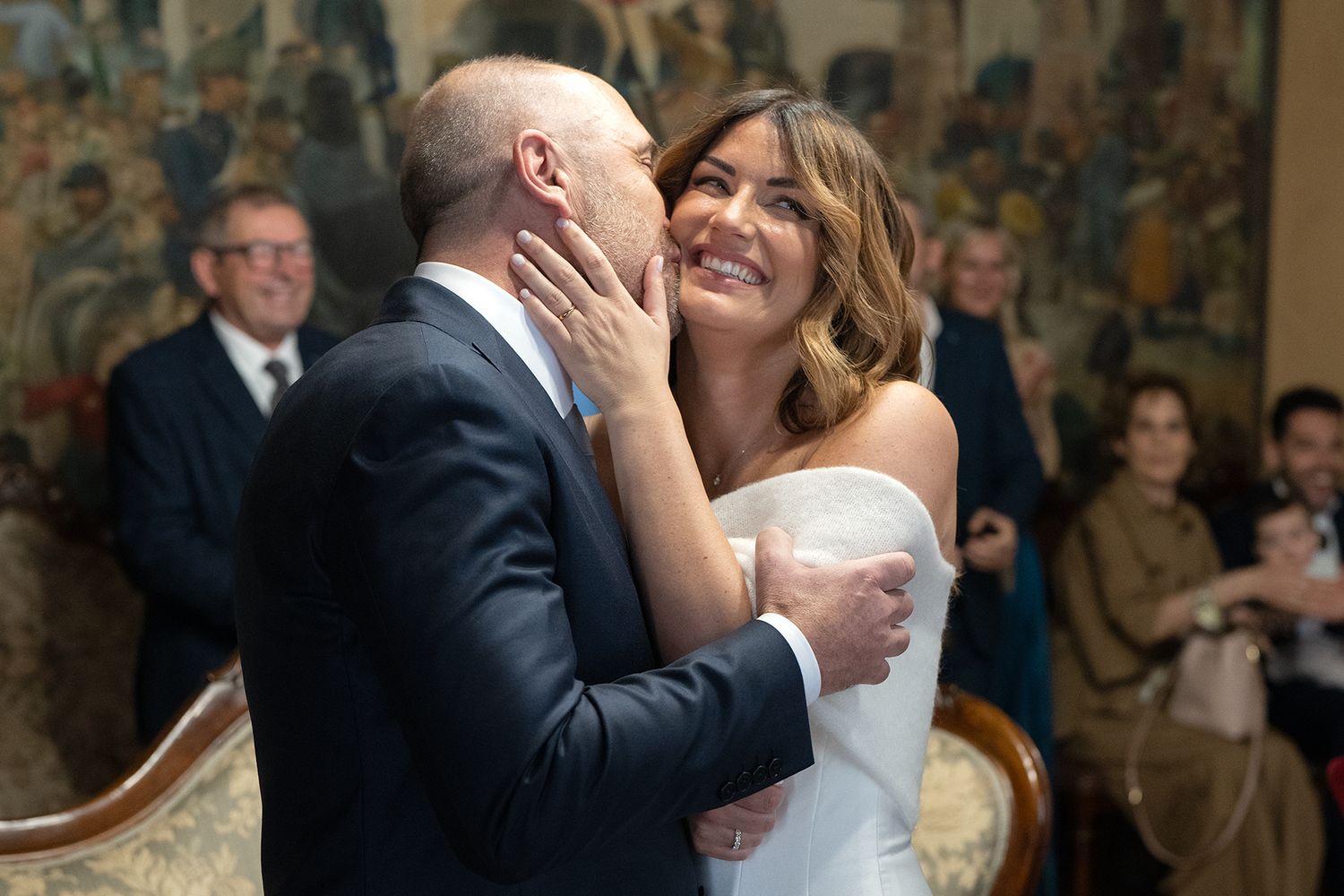 An intimate moment between newlyweds during their wedding ceremony.