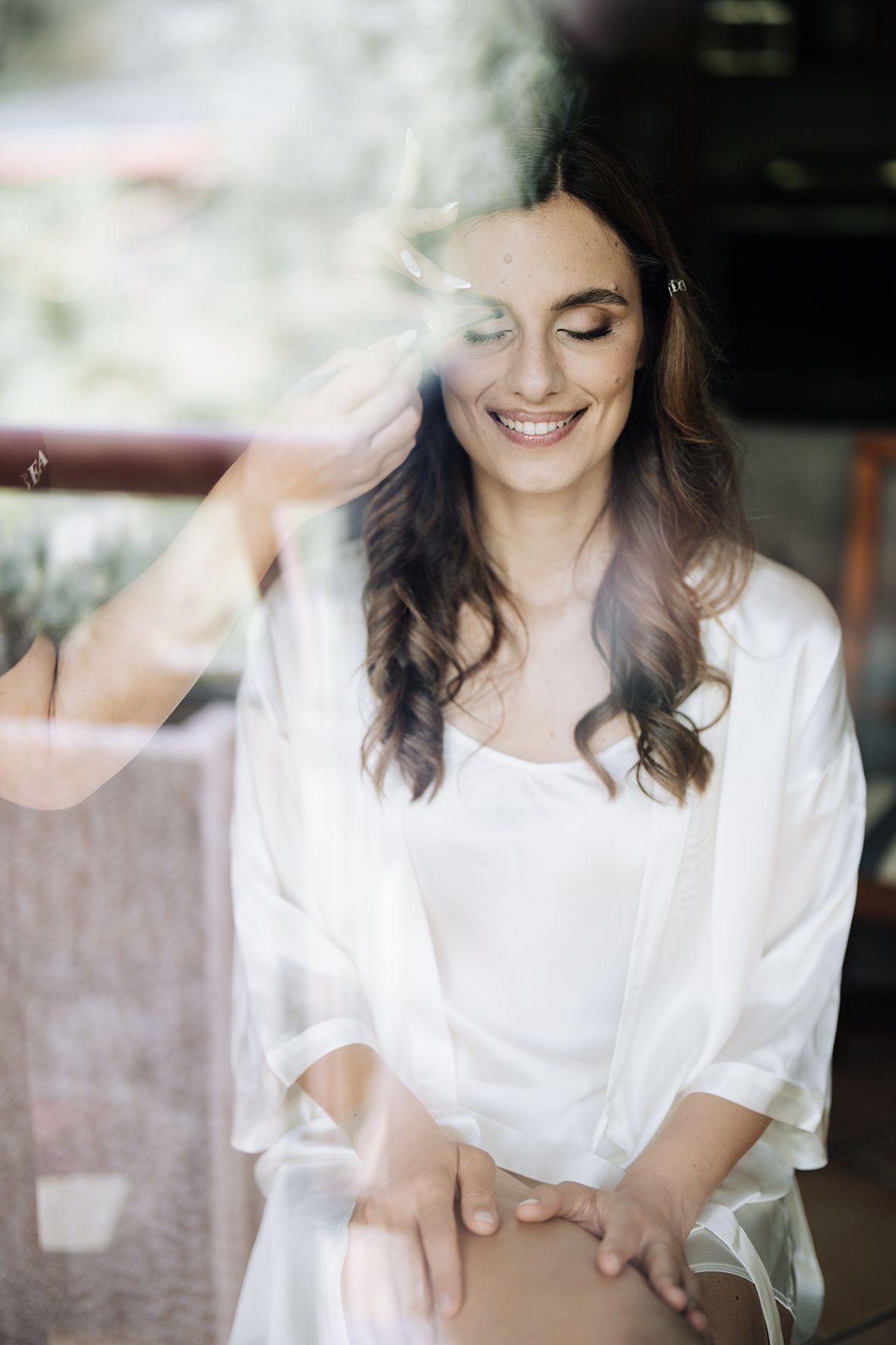 Soft focus shots of someone in a white shirt with natural lighting.