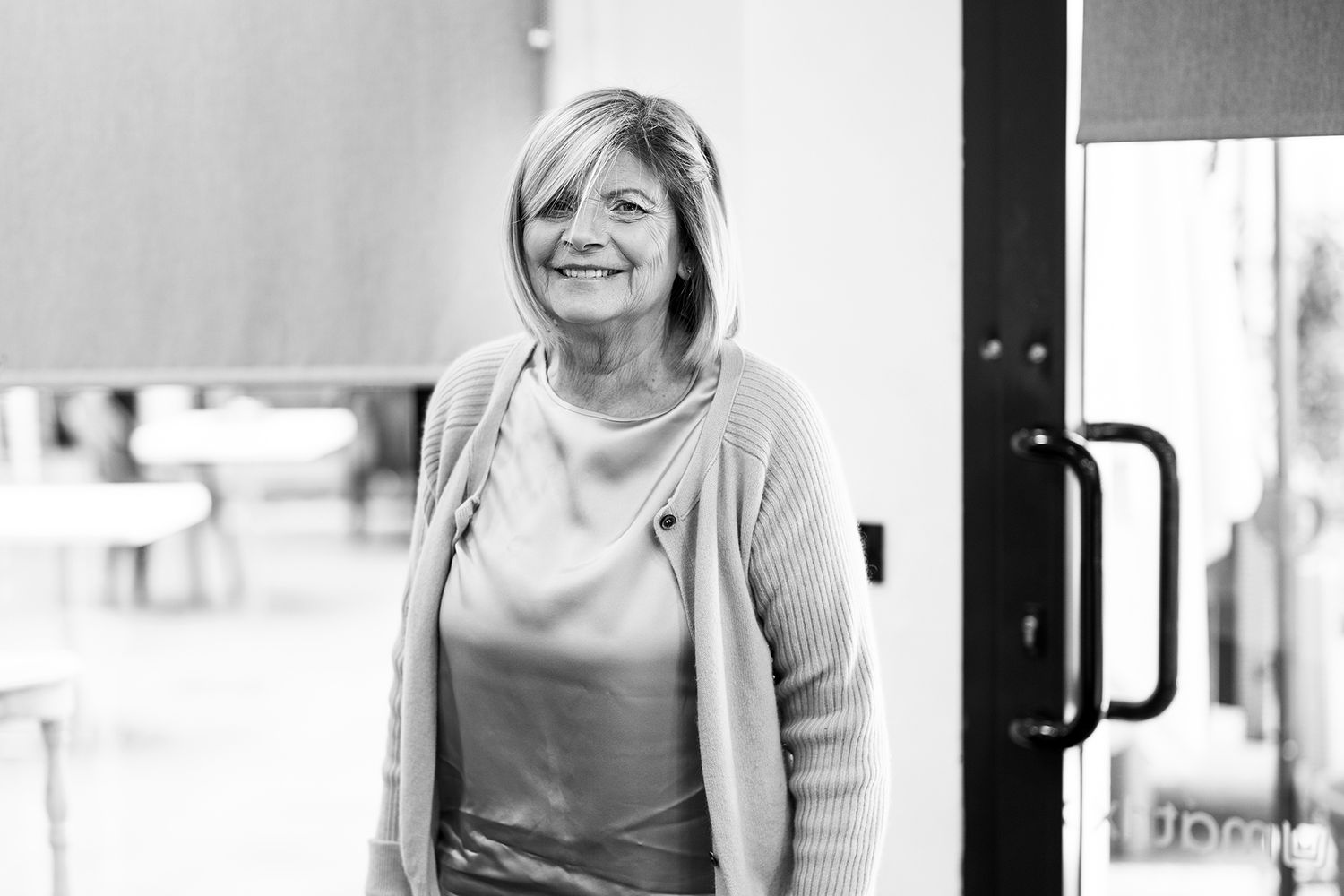 Black and white portrait series showing candid moments in natural light.
