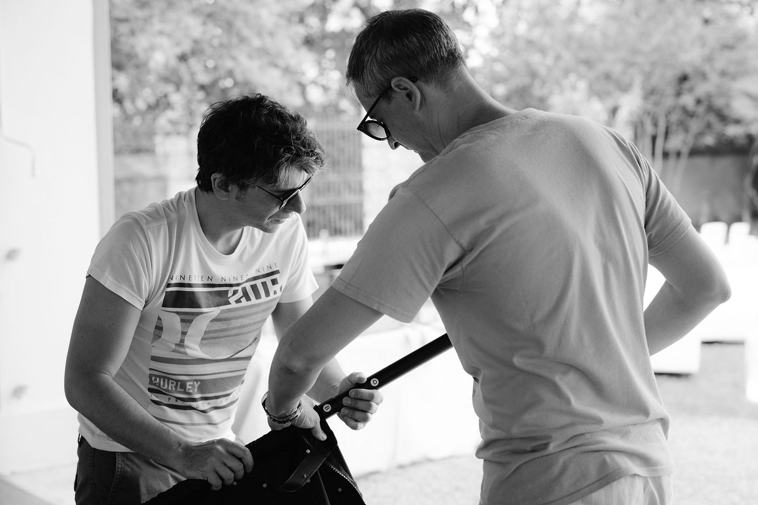 Black and white images showing martial arts instruction and practice moves.