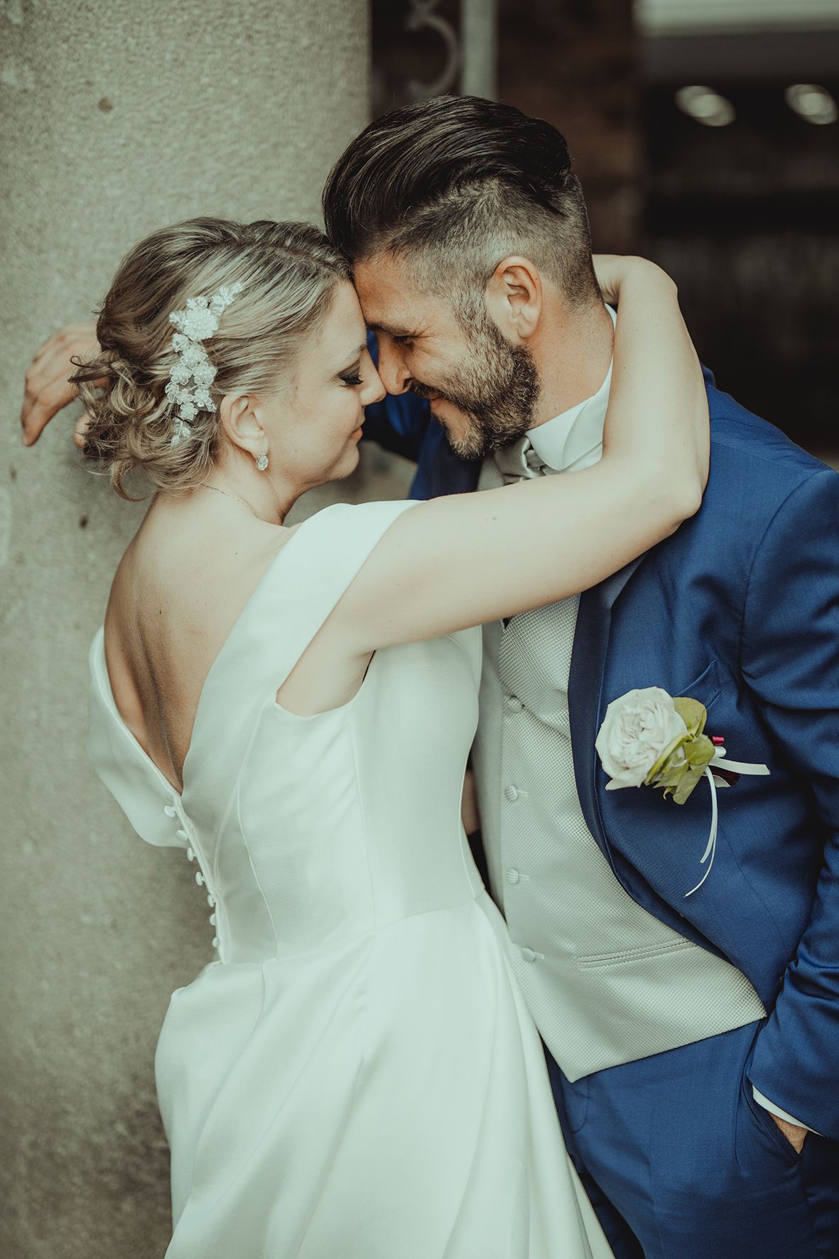 Sequence of intimate wedding photos capturing romantic moments between newlyweds.