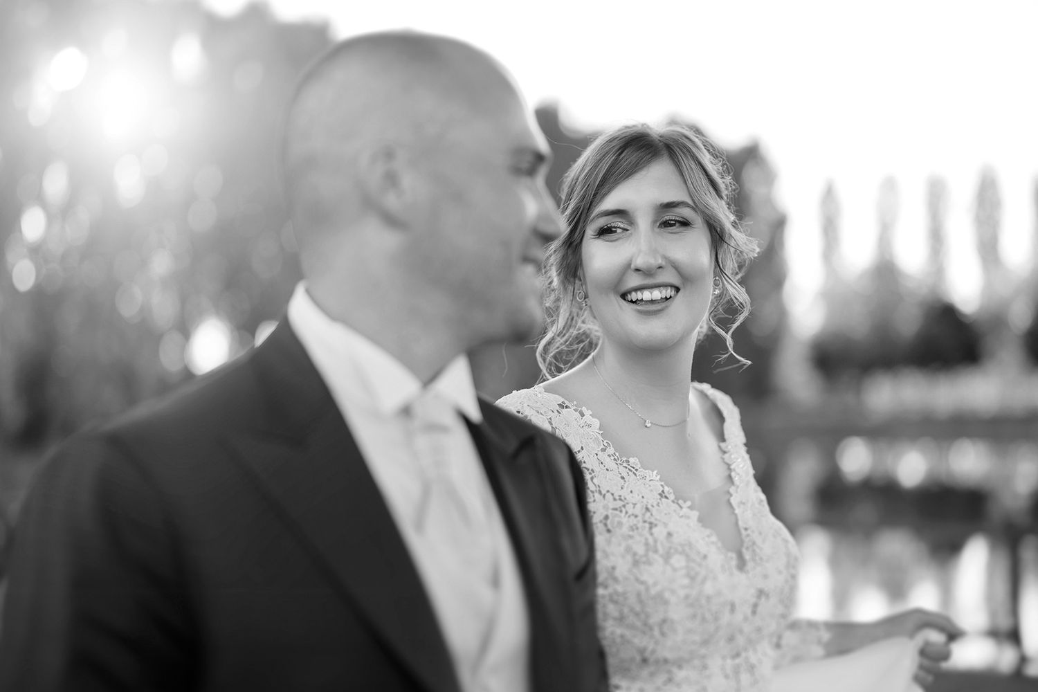 Black and white wedding portraits showing joyful moments during the celebration.