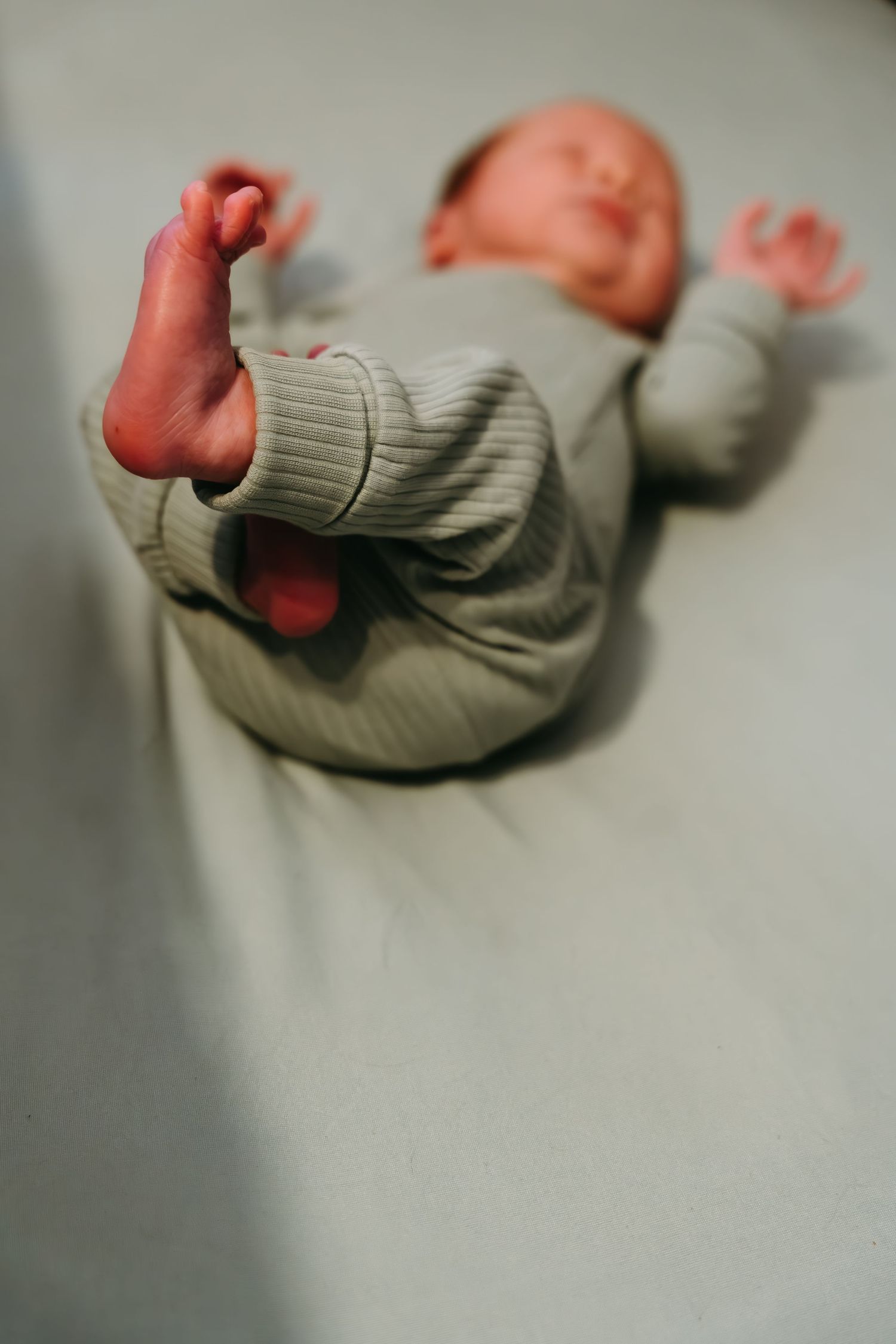 Close-up motion shots of feet in motion against a gray background.