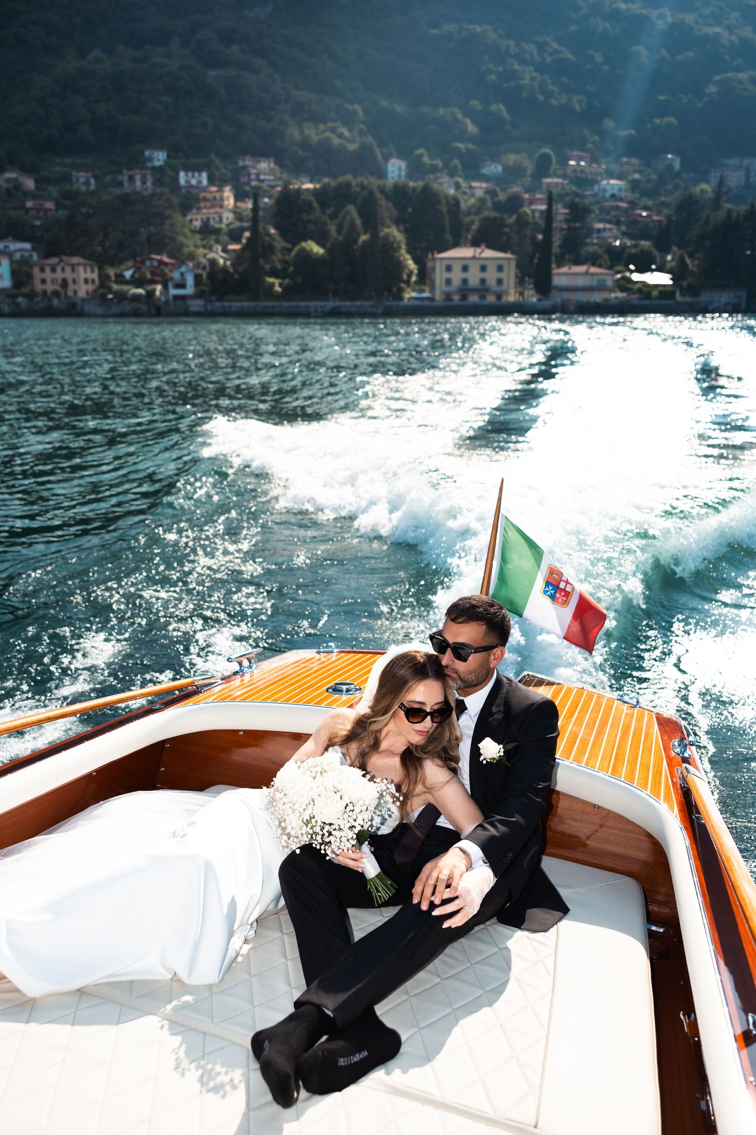 Romantic boat ride for the bride and groom on Lake Como after their Italian wedding.
