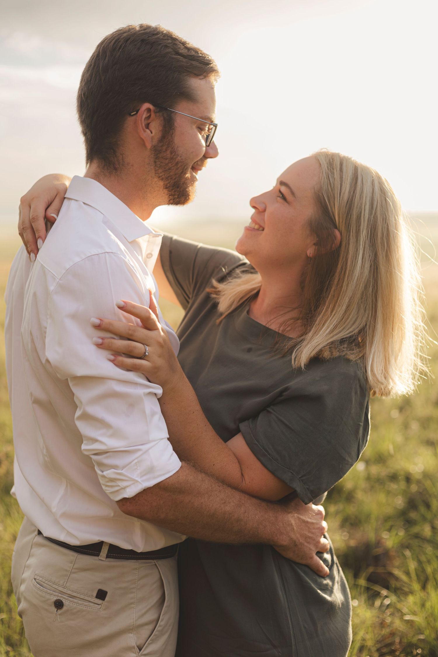A warm sunset moment showing connection and joy between two people.