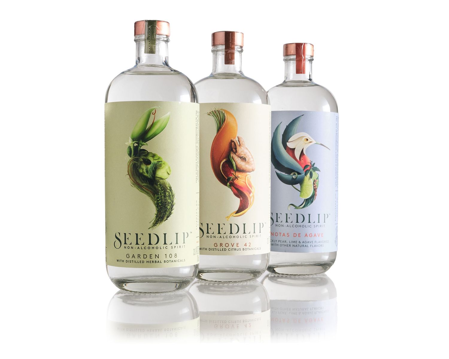 Seedlip non-alcoholic sprit bottles on a white background with a reflection