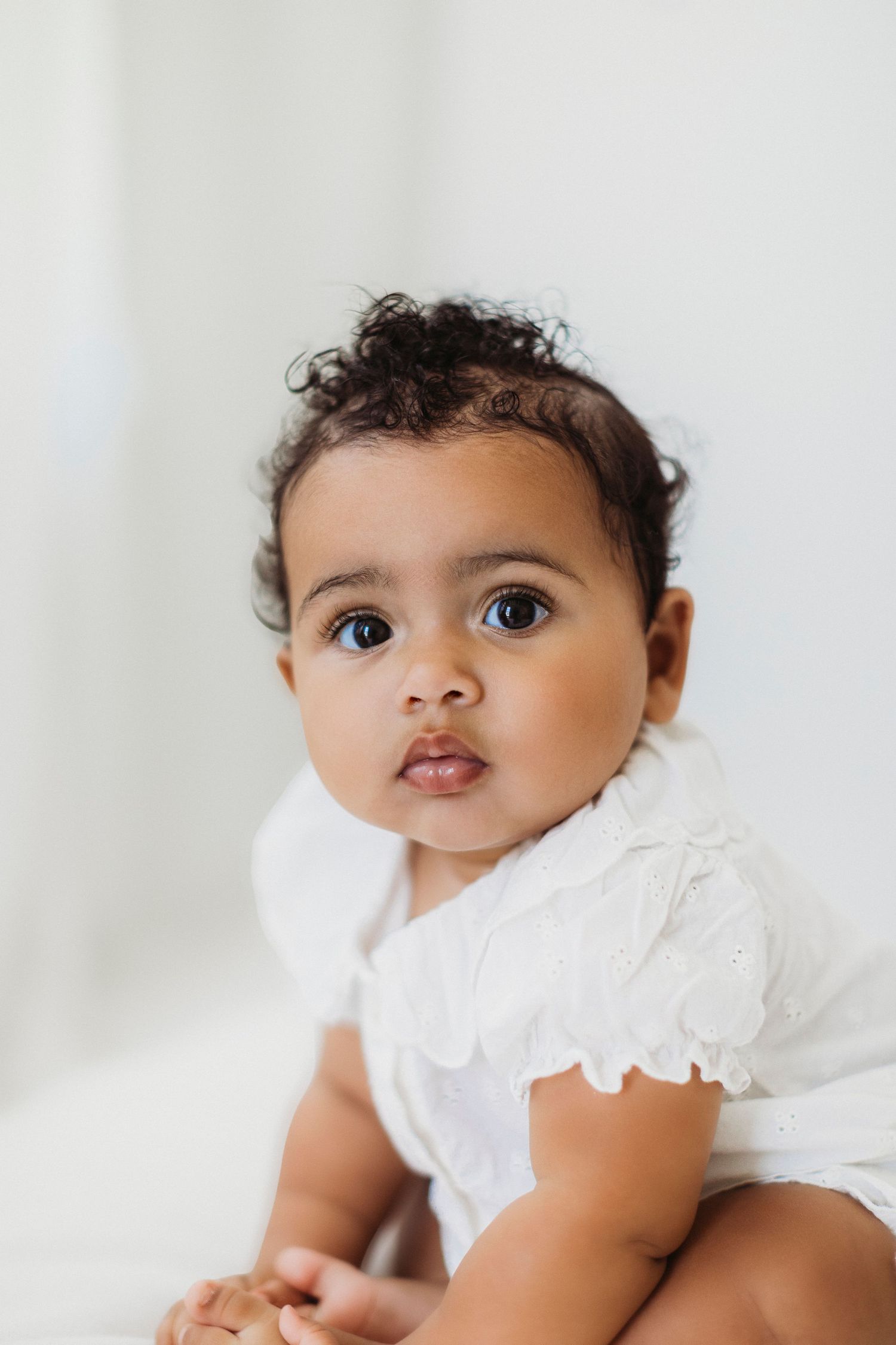 Light-filled portrait by Modesto newborn photographer Mikayla Mendes