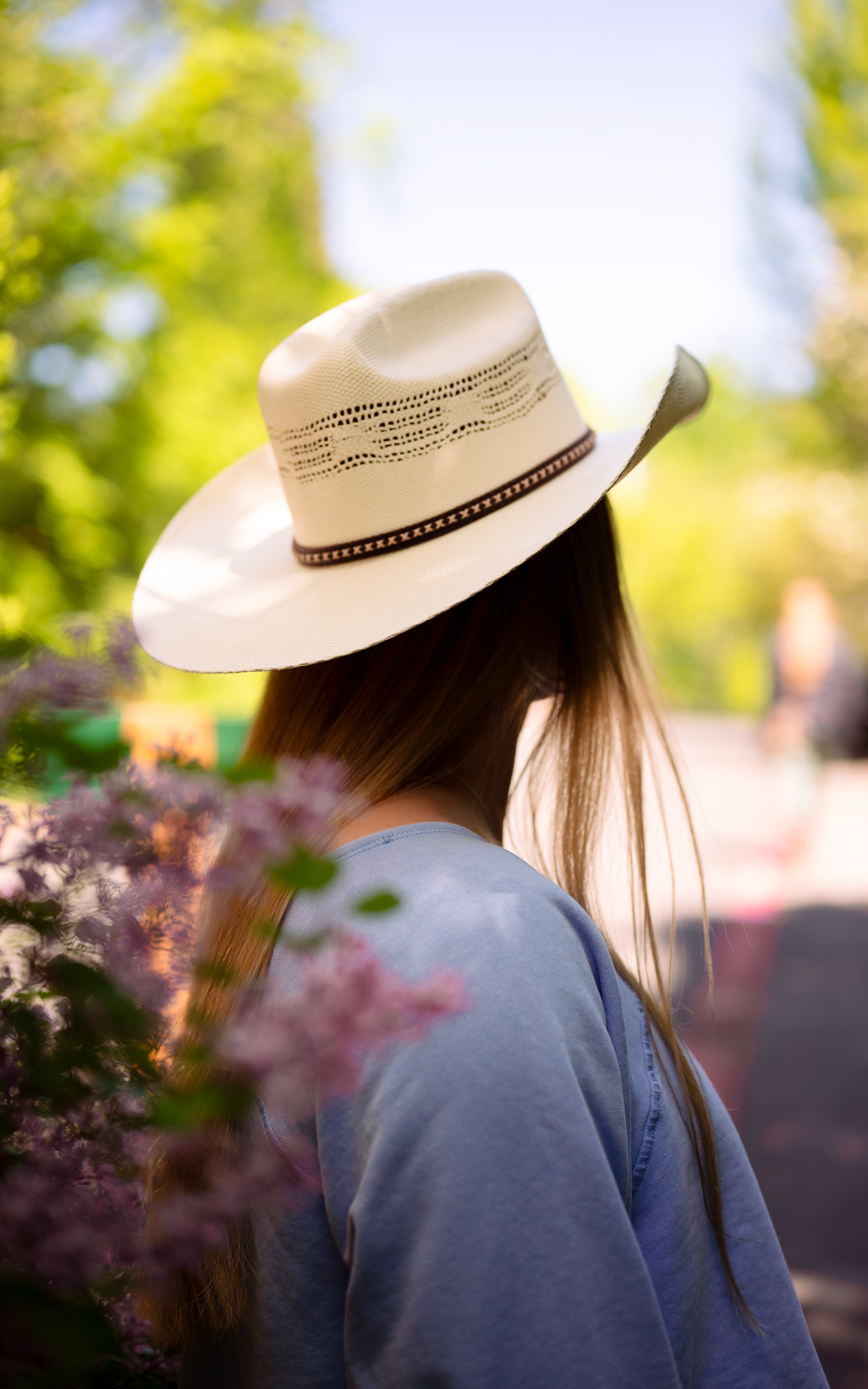 country portrait cowgirl hat flowers nature senior portrait photos season glamour shots