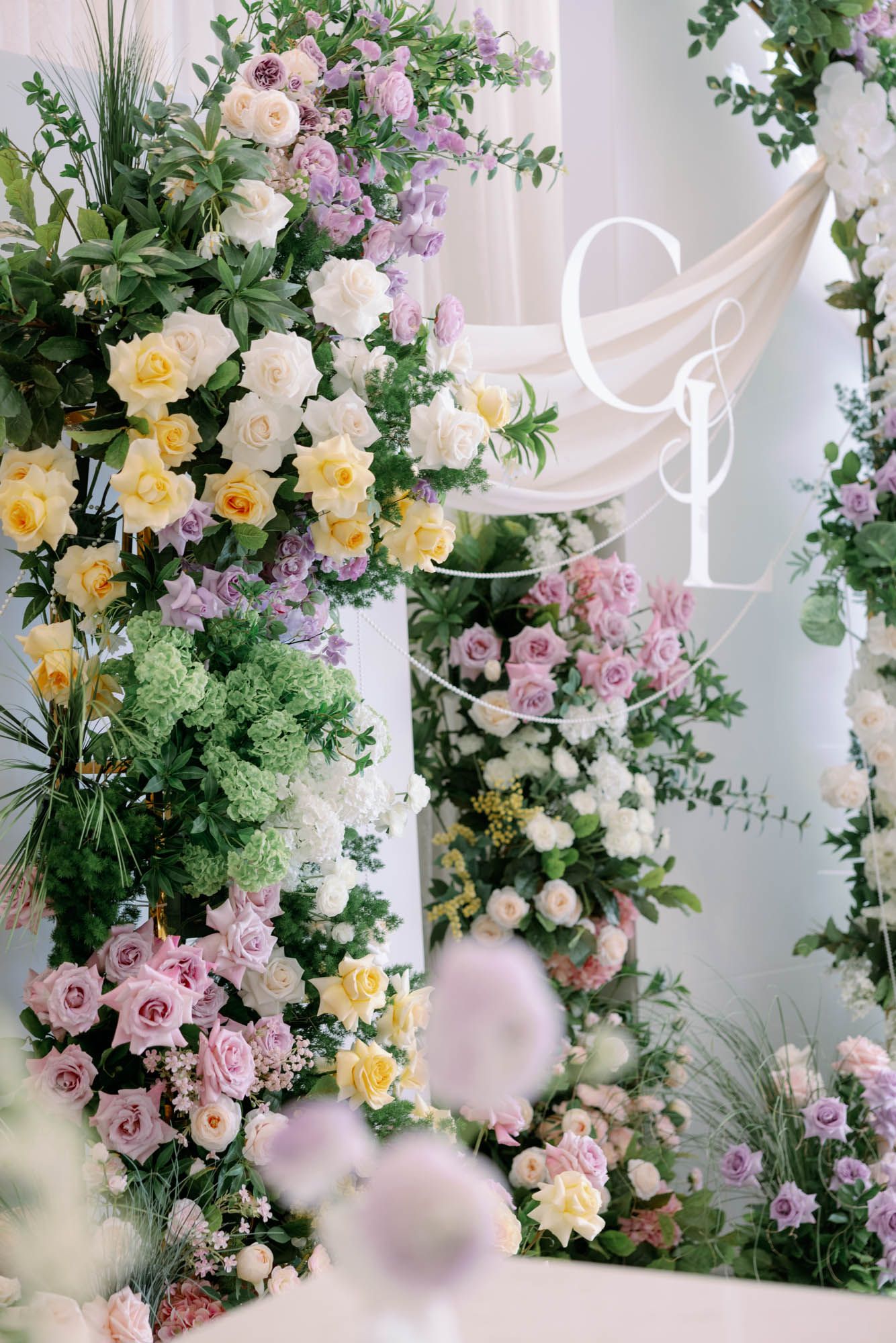 pearl hotel toronto wedding colorful floral arch summer