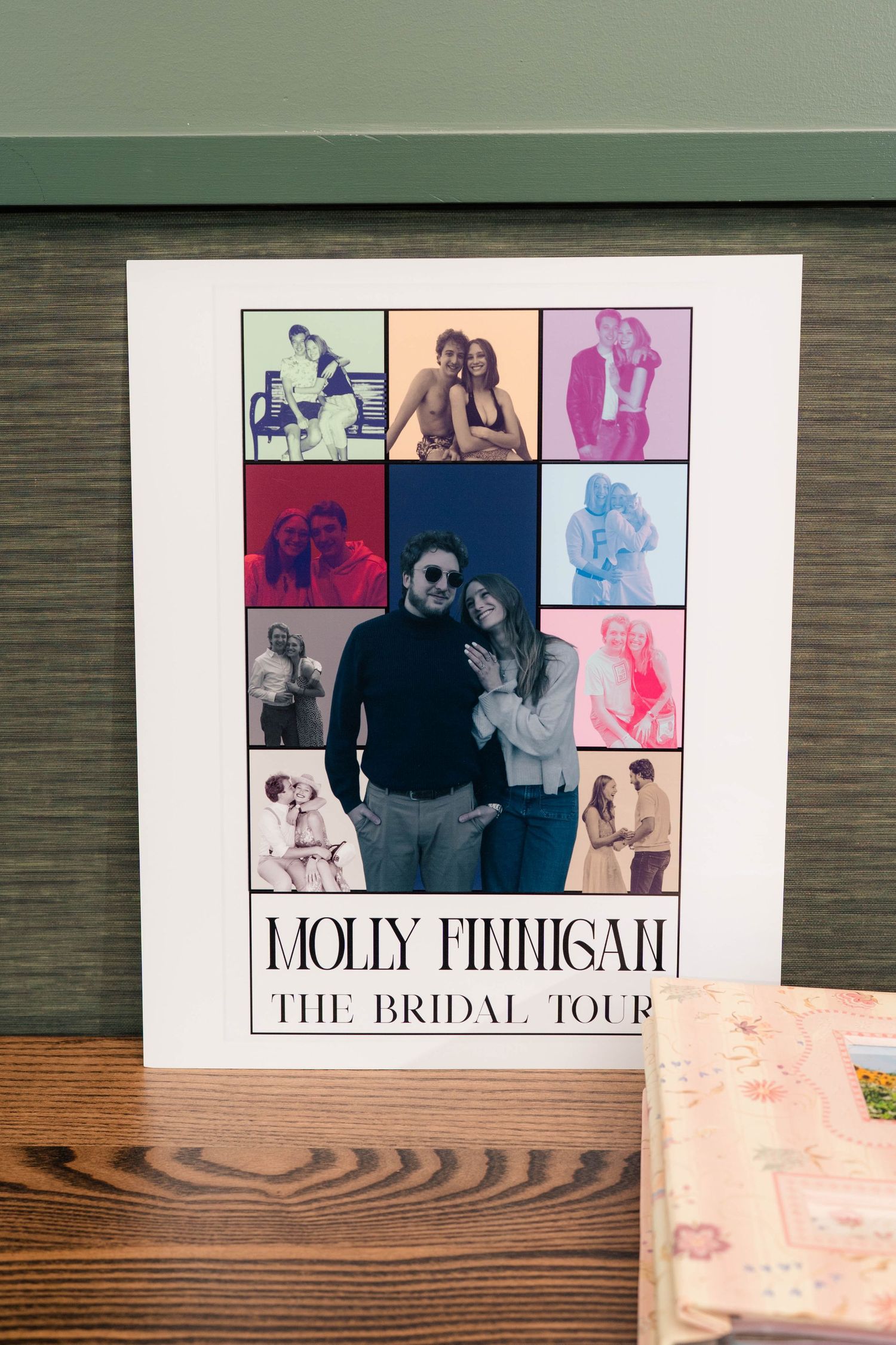 Custom Molly Finnigan bridal tour photo collage poster displayed on a wooden table as wedding decor.