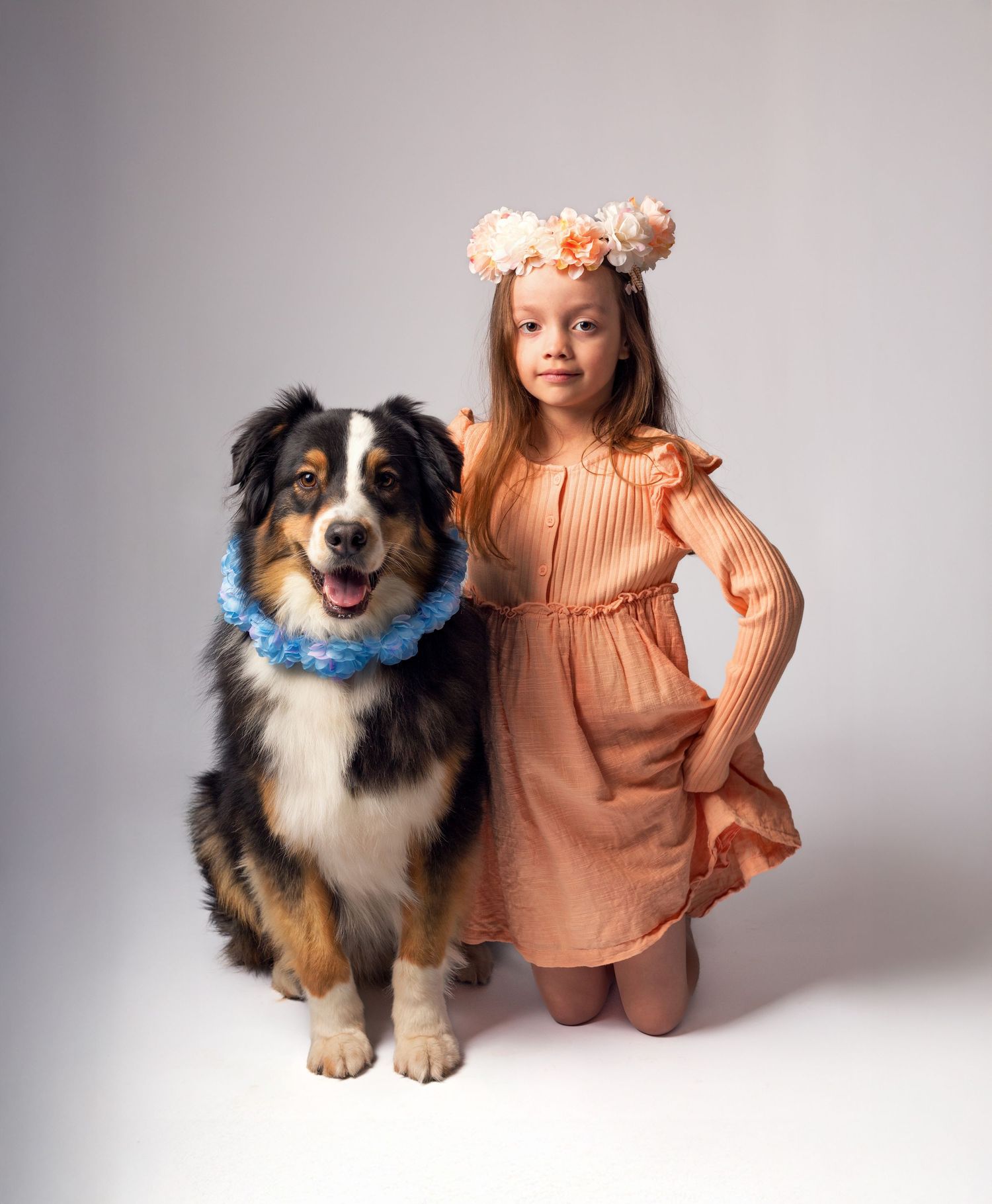 Girl and dog with flower crowns