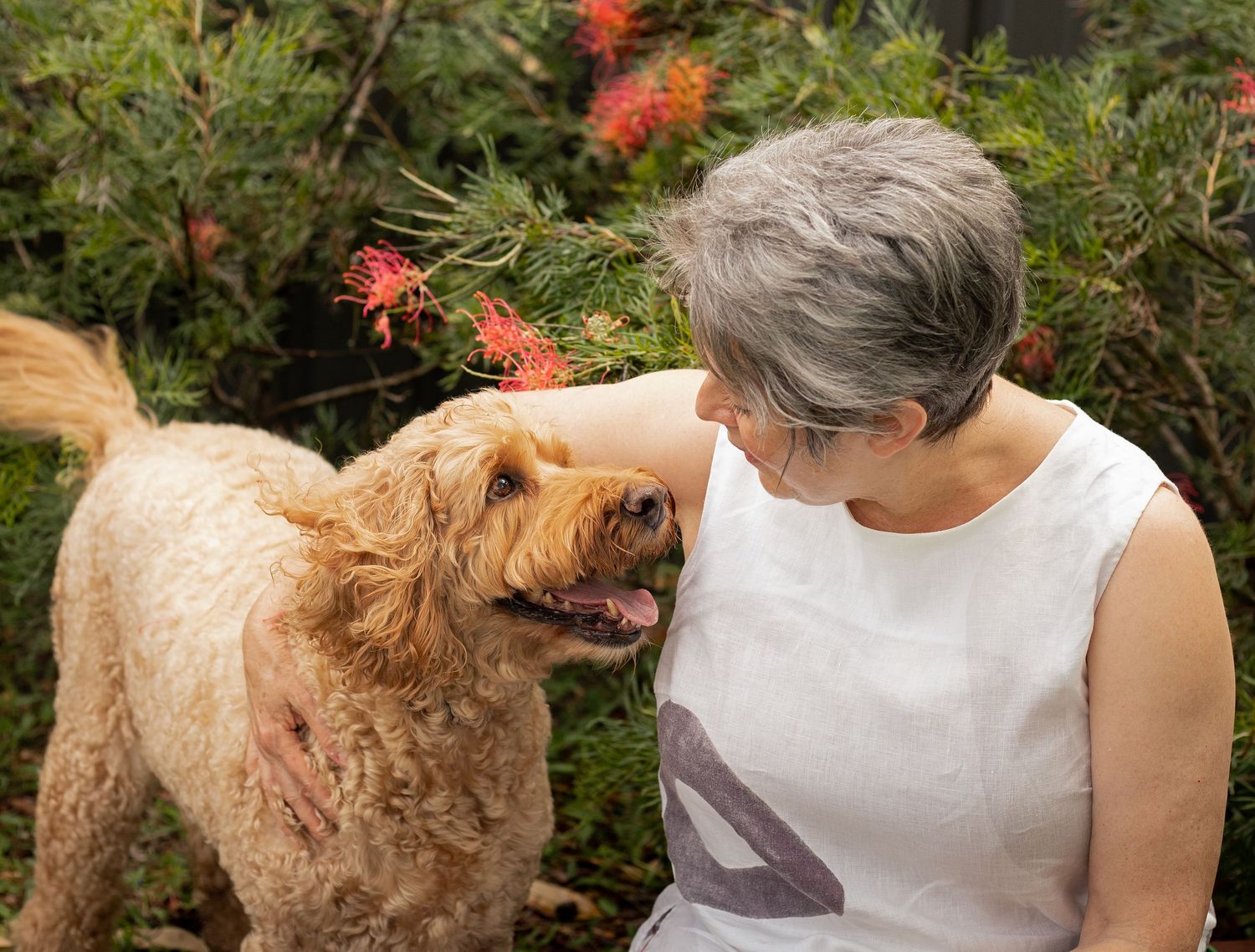 Woman hugging dog