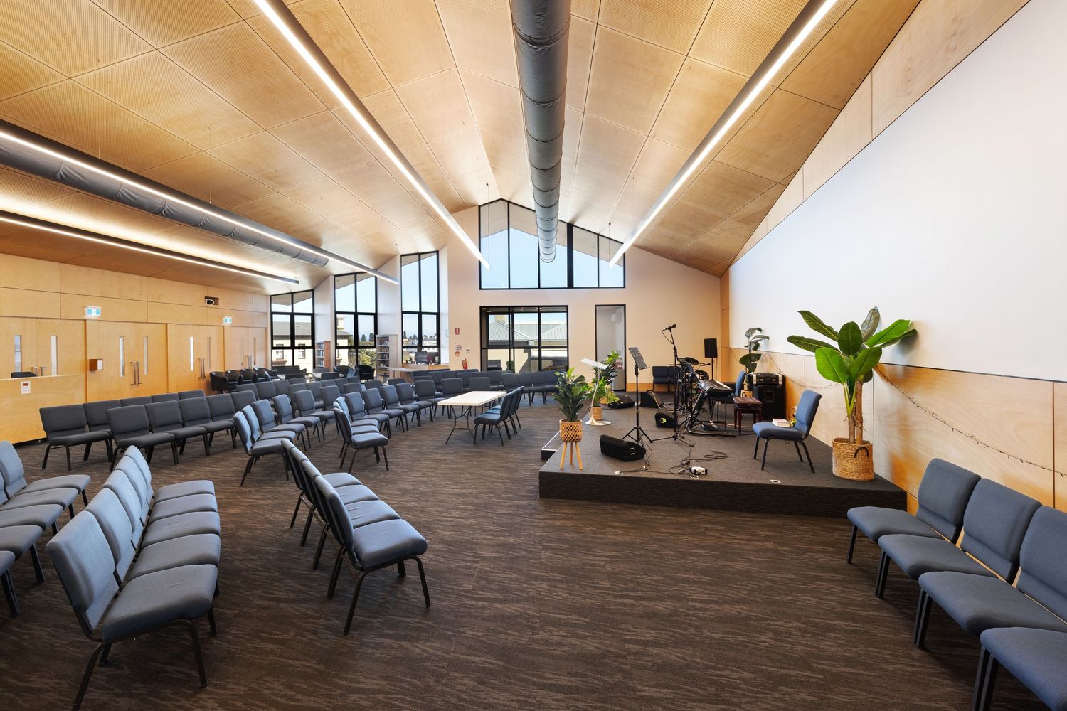 Interior photograph of a modern waiting room or lounge area with timber ceiling detail.