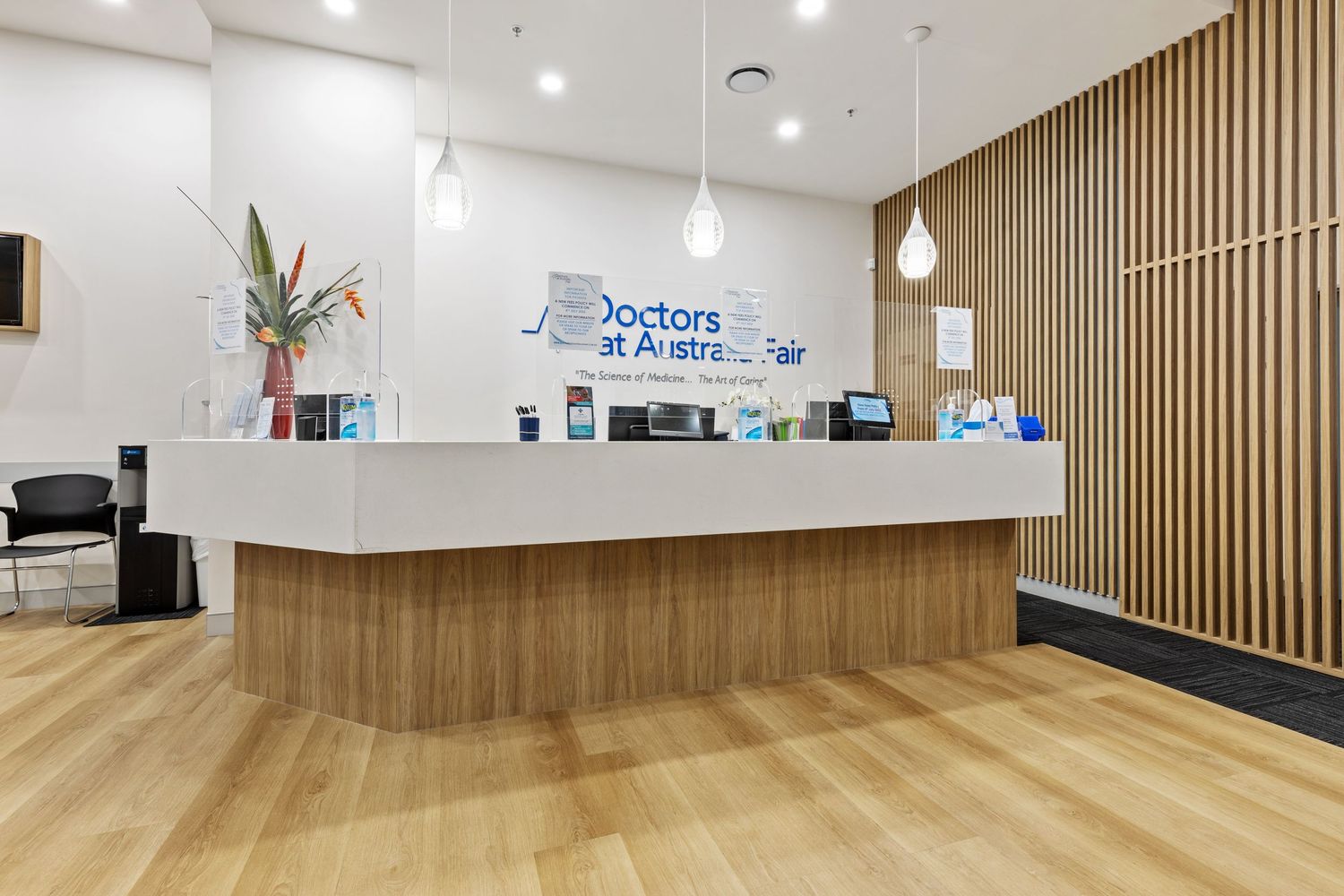 Interior photograph of a medical clinic reception desk with timber fit-out.