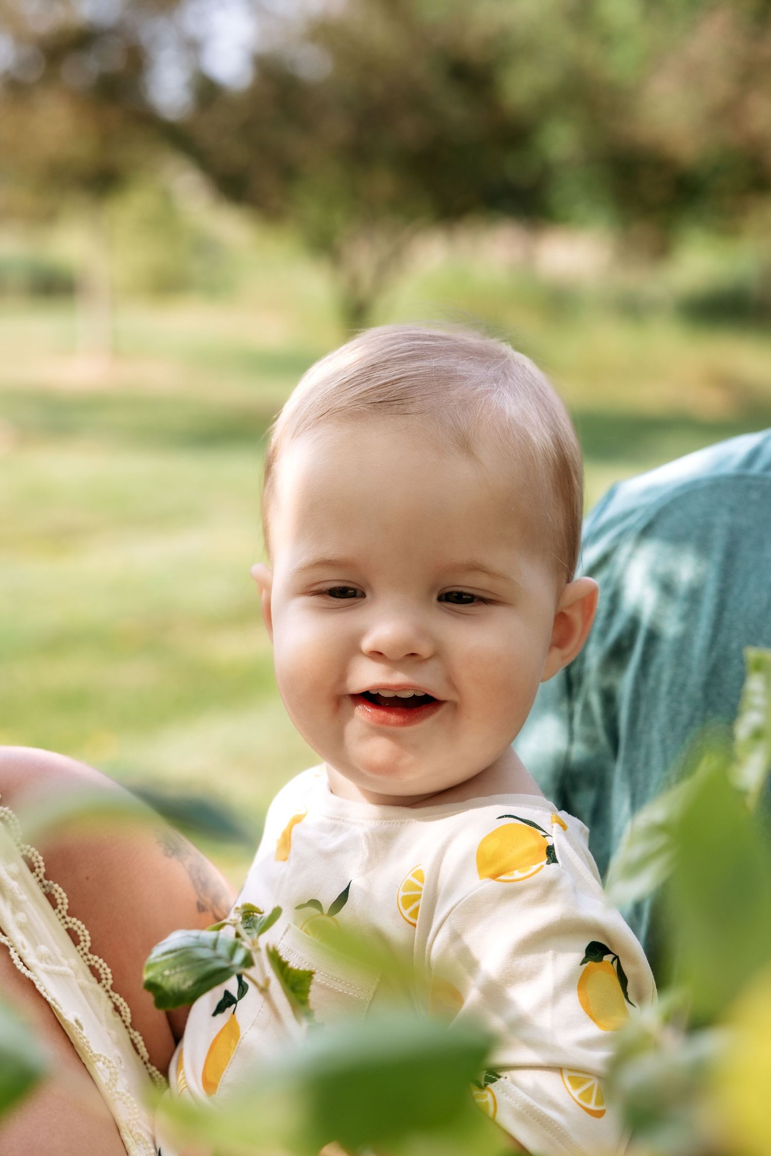 Little boy smiles during mini session in Novi Michigan by Rachel Martinez Photography