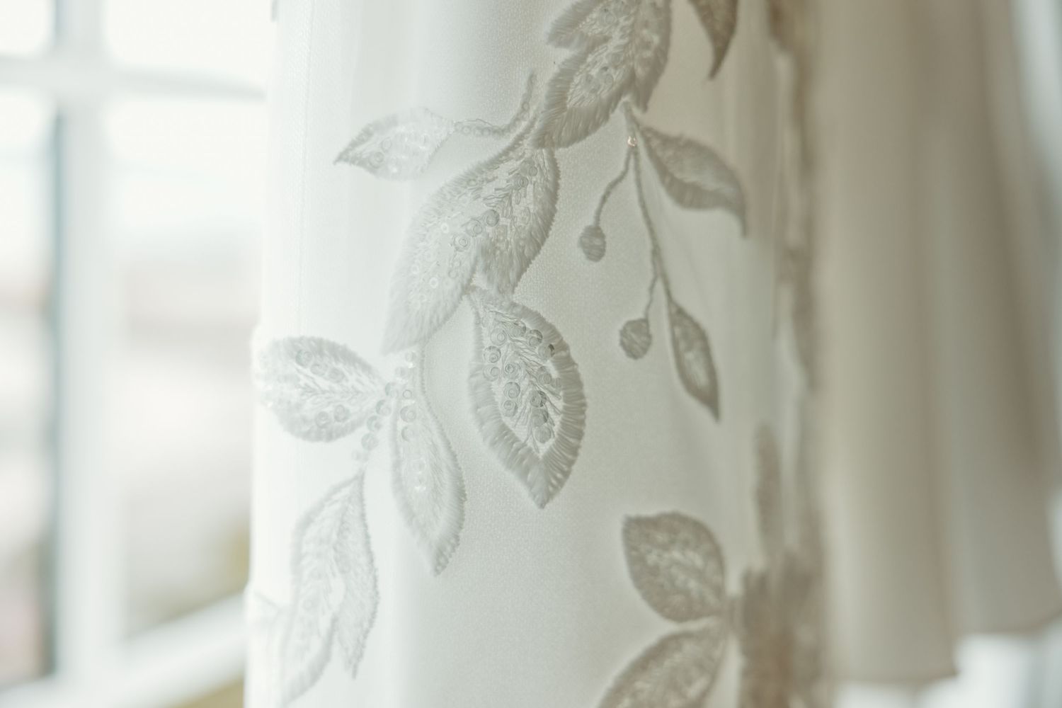 Close up of lace embroidery on dress at St. Clair in by Michigan Wedding Photographer Rachel Martinez Photography