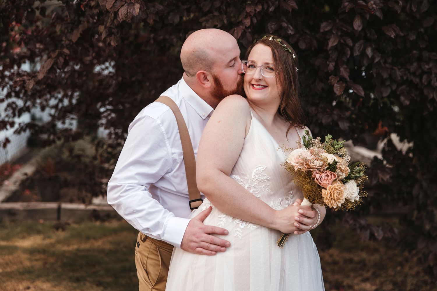 Groom kisses bride on cheek at their micro wedding in Seattle Washington by Rachel Martinez Photography, Michigan wedding photographer