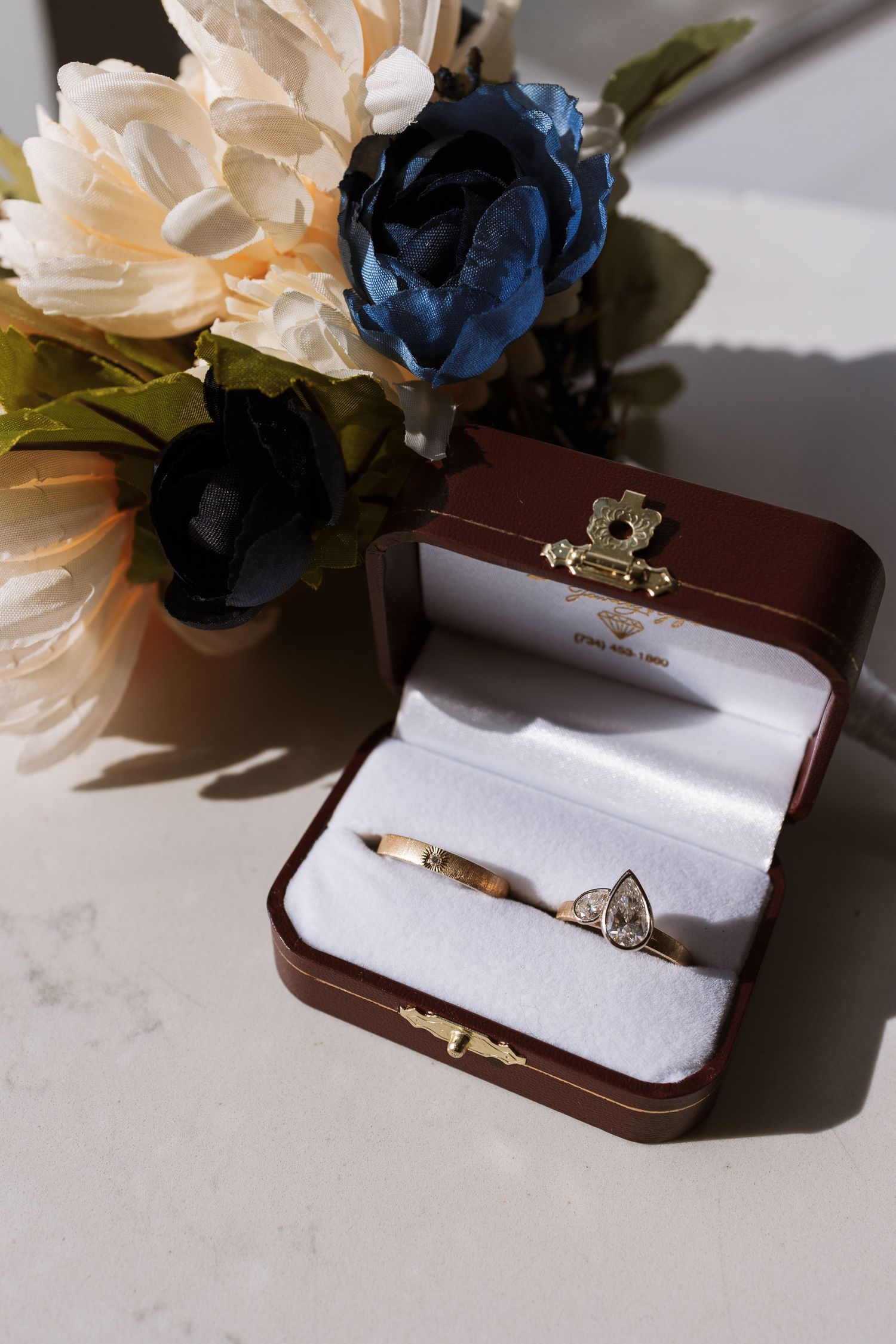 Close up of wedding bands in their box in Downtown Detroit by Michigan Wedding Photographer Rachel Martinez Photography