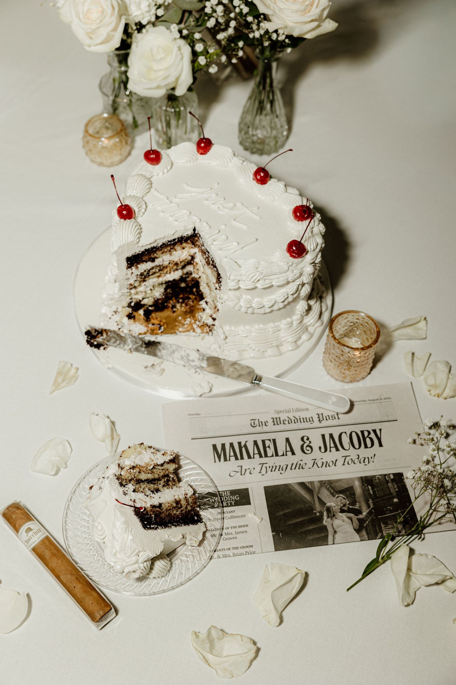 Editorial image of cut cake, cigar, and wedding day newspaper taken with flash by Detroit Wedding Photographer Rachel Martinez Photography