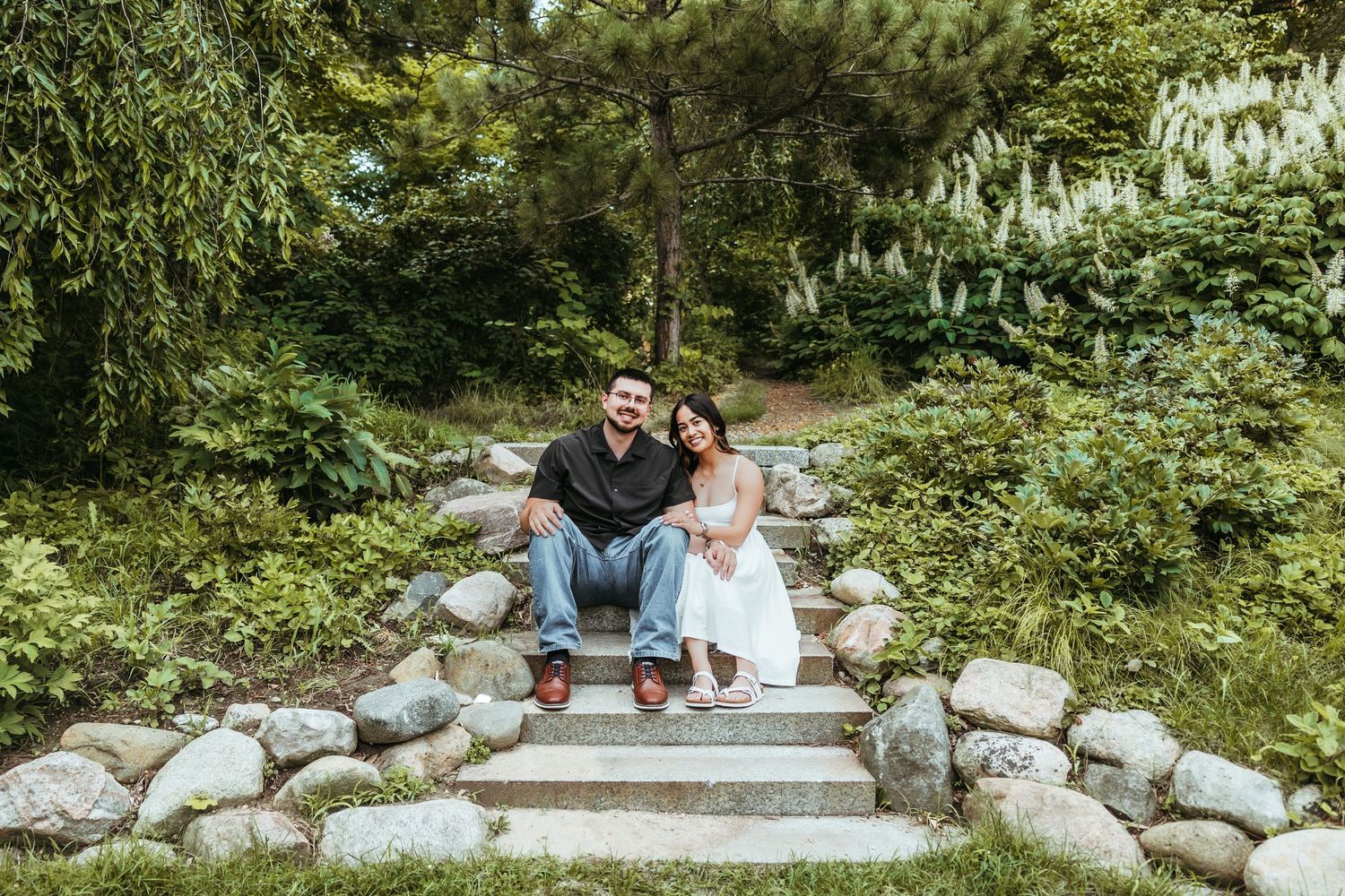 Couple sits side by side in the UM Arb in Ann Arbor by Rachel Martinez Photography, Michigan Wedding Photographer