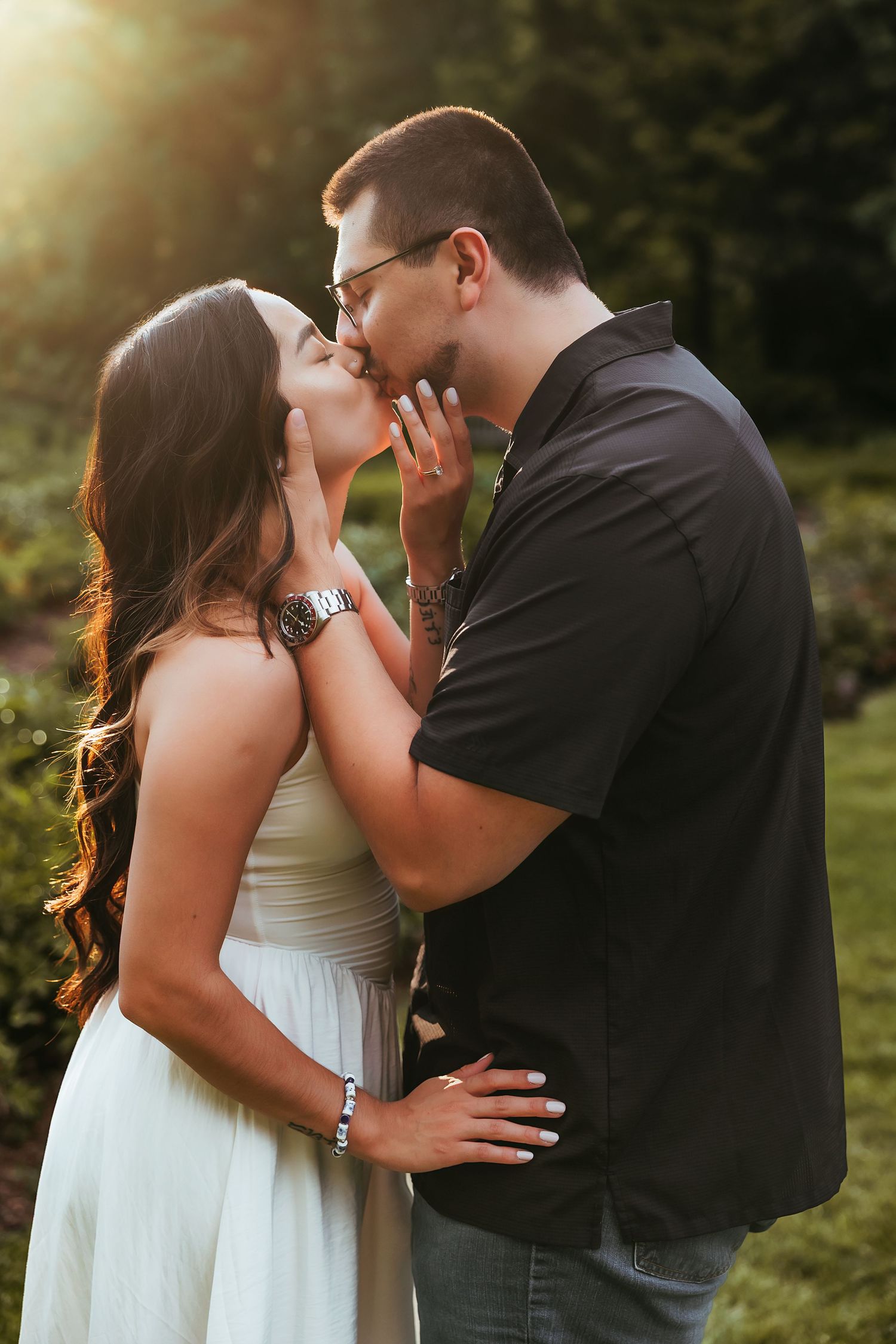 Couple kisses in golden hour light at the Arb in Ann Arbor by Rachel Martinez Photography, Michigan wedding photographer
