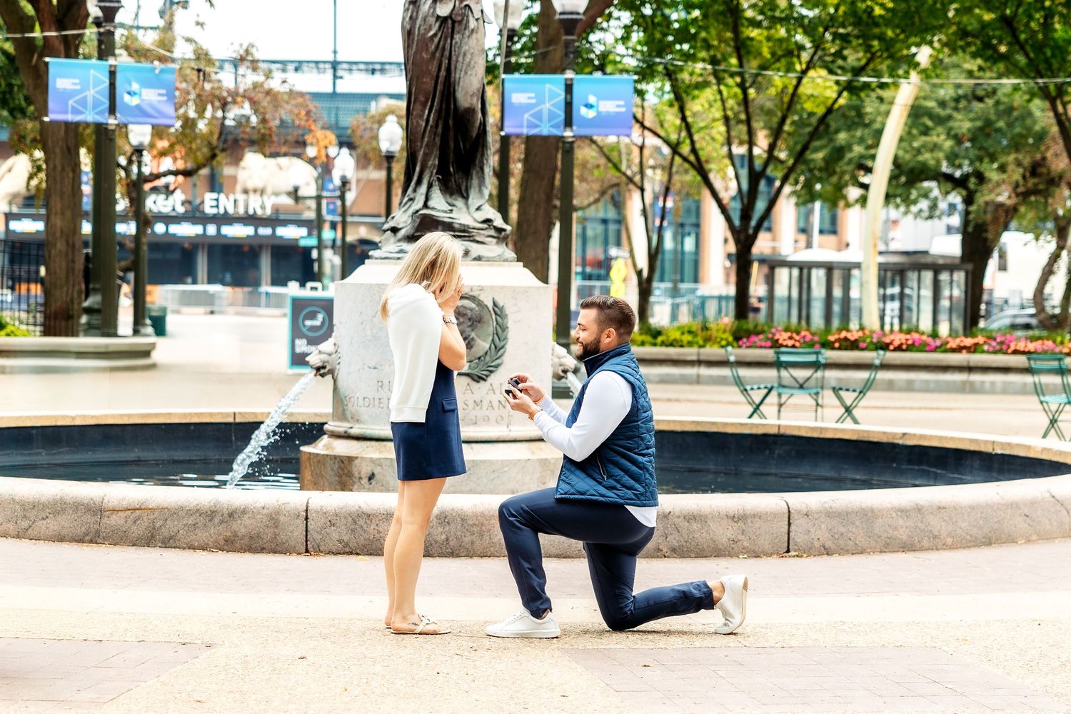 Man proposes in downtown Detroit across from Comerica Park by Rachel Martinez Photography, Michigan wedding photographer