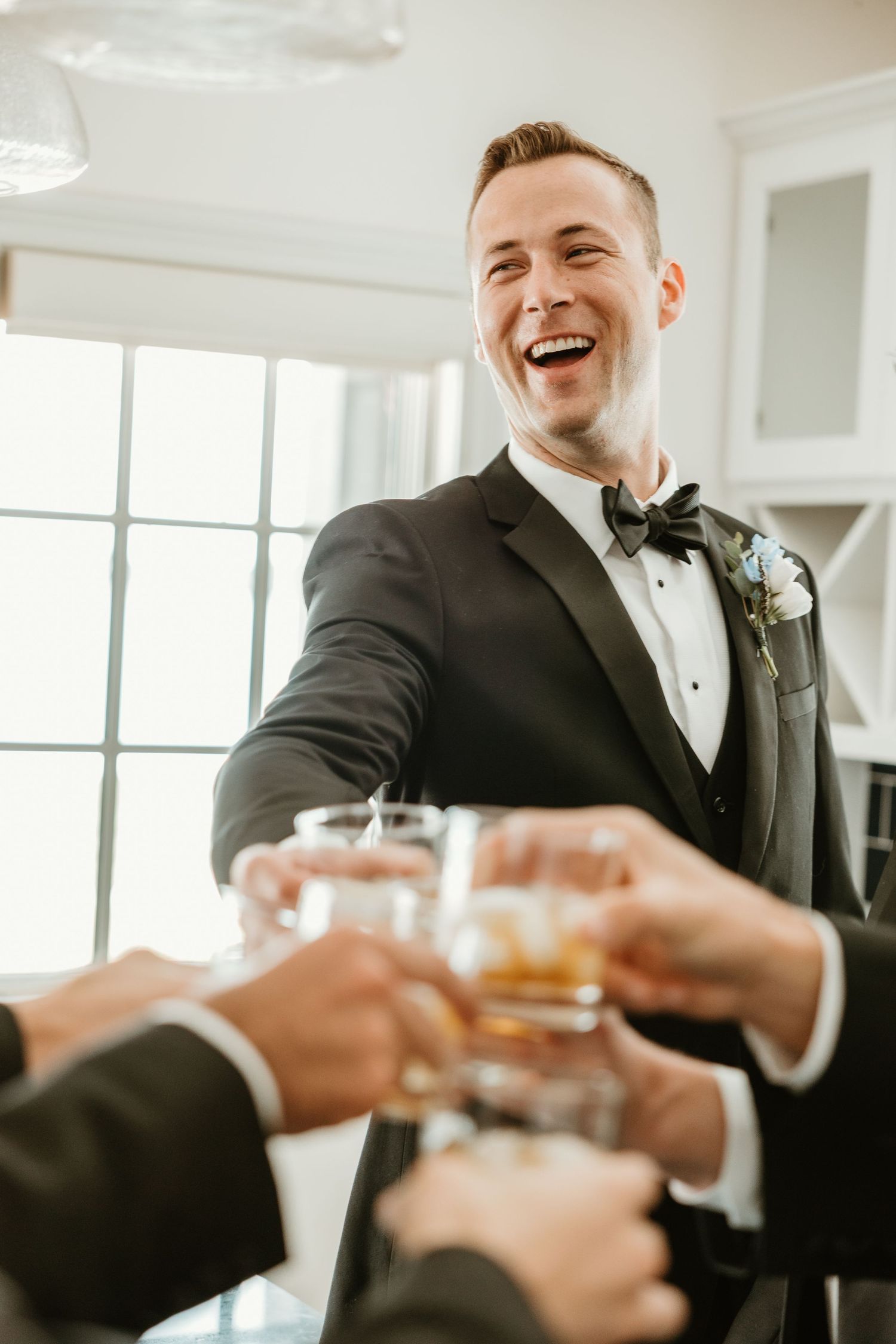 Groom toasts his groomsmen at the St. Clair Inn by Rachel Martinez Photography, Michigan wedding photographer