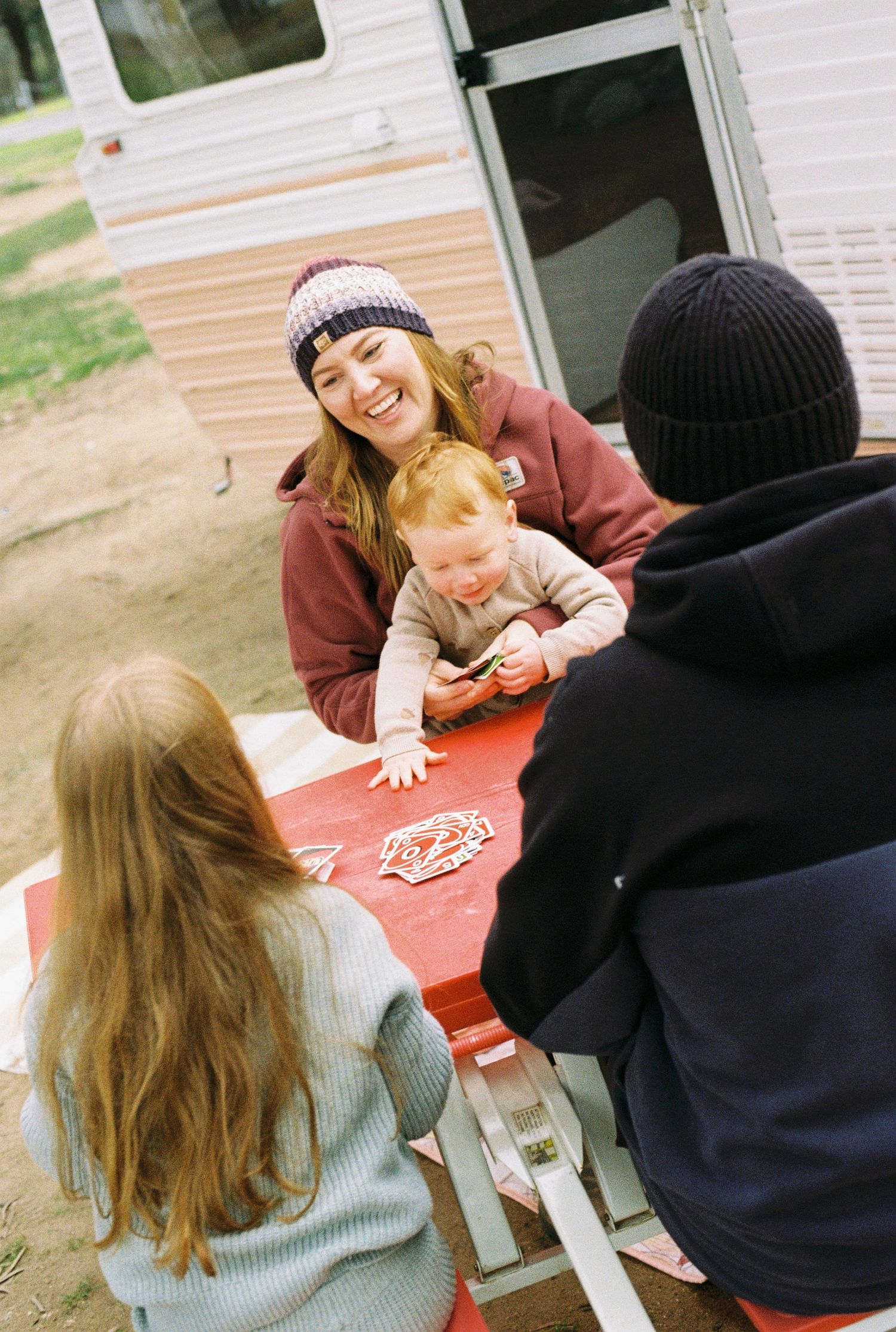family playing card games captured on 35mm film