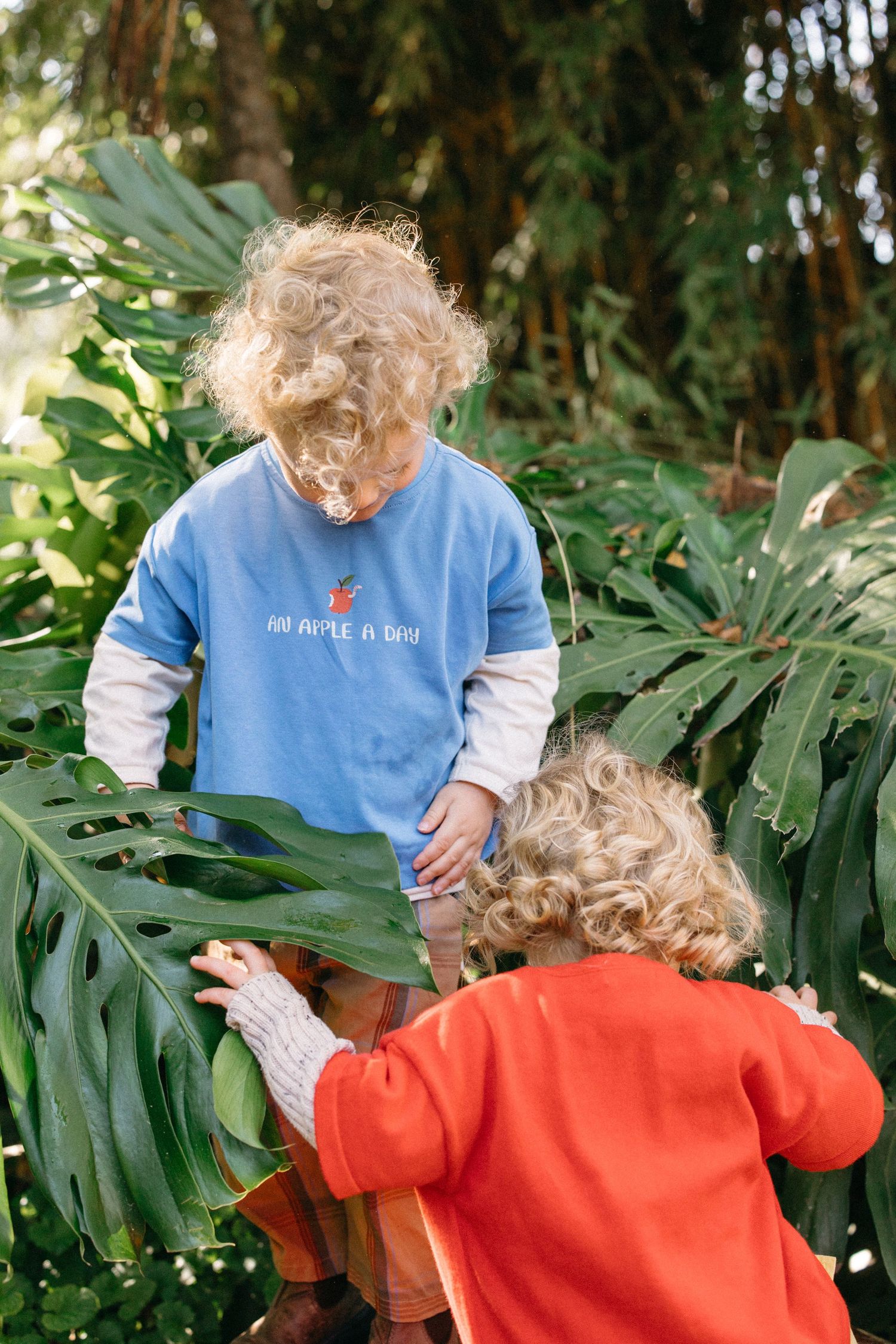 two children playing together outdoors
