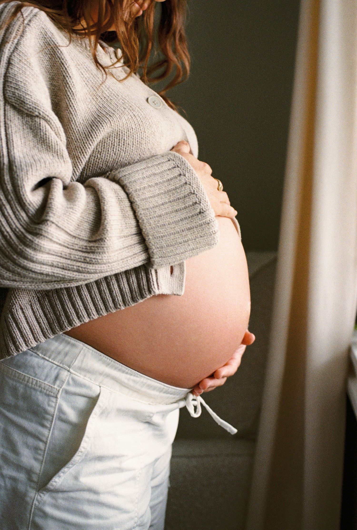 pregnant belly captured on 35mm film