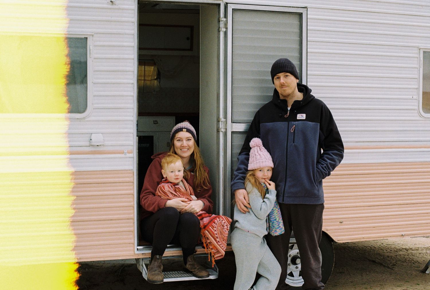family photo outside caravan captured on 35mm film