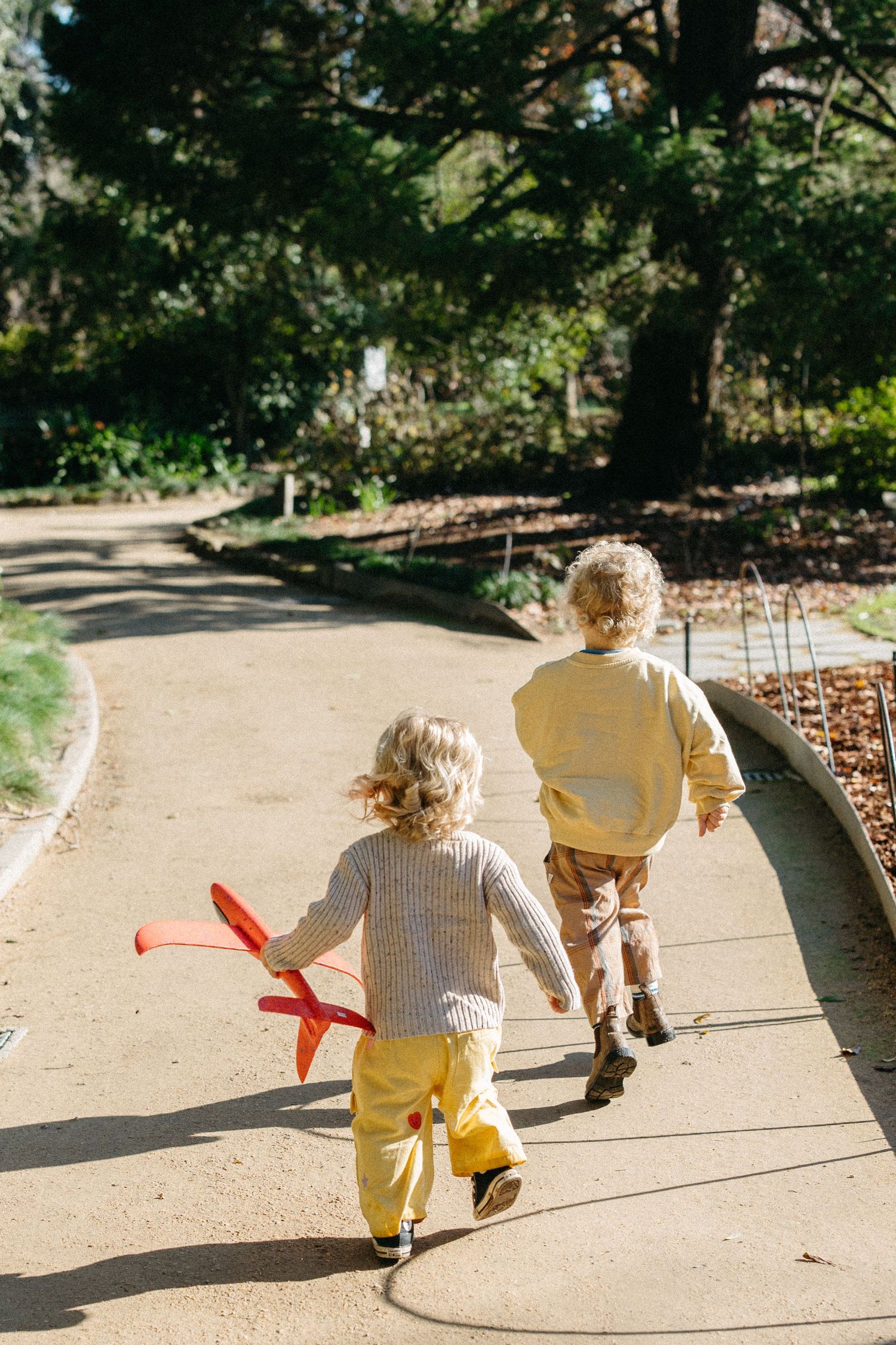 two children playing together outdoors