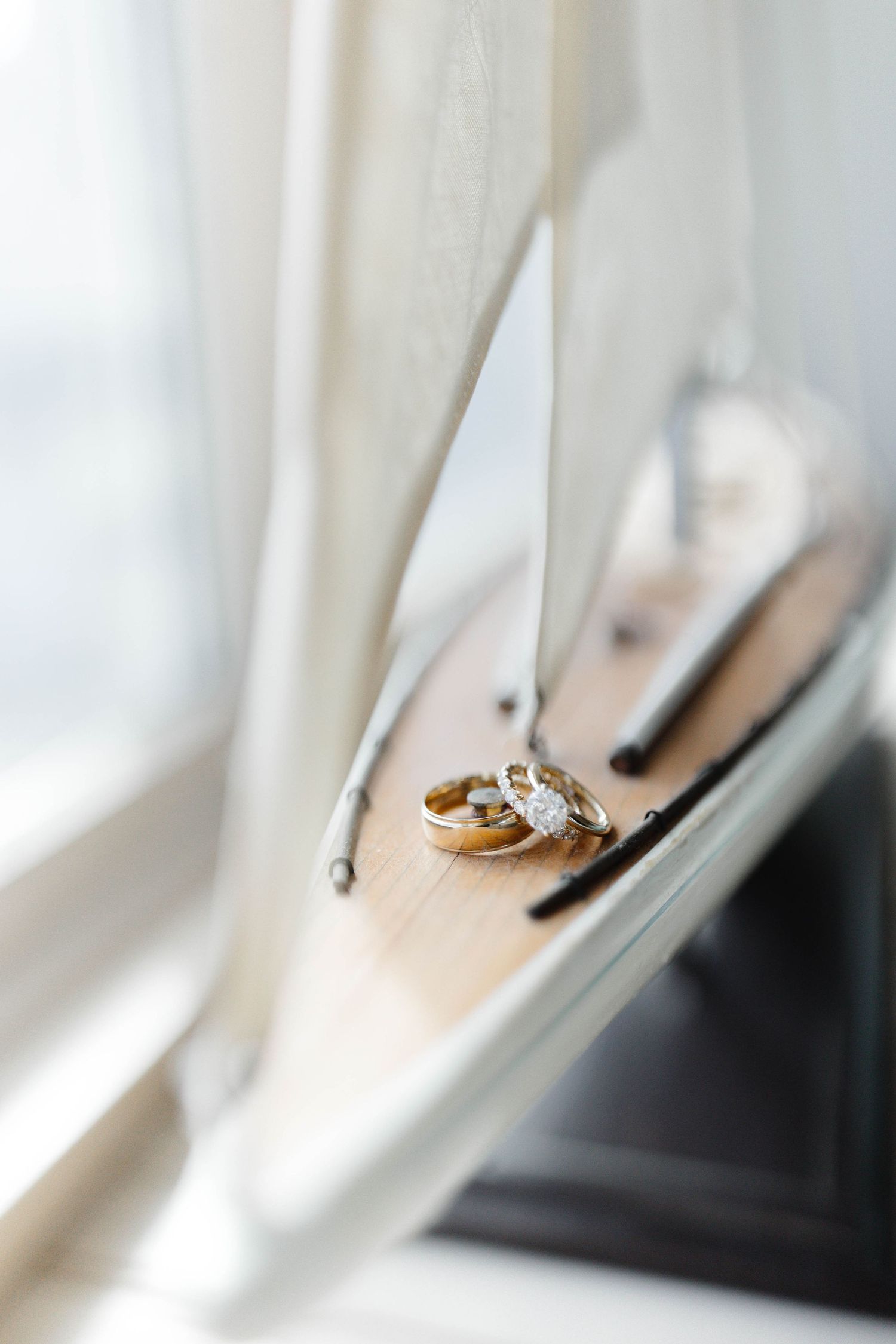 Close-up detail of delicate white fabric texture in soft lighting.