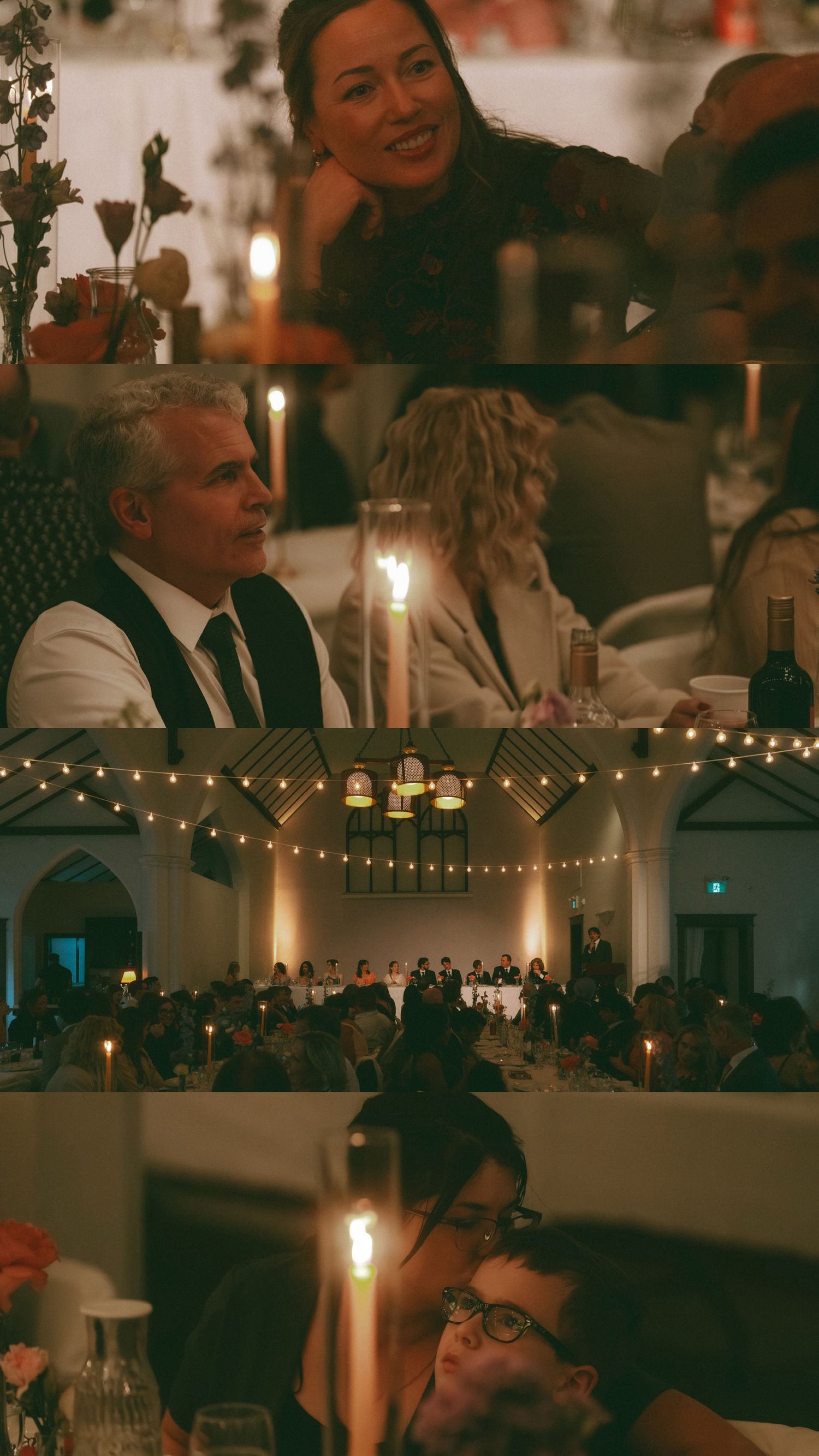 Wedding reception venue decorated with string lights and candles creating warm ambiance.