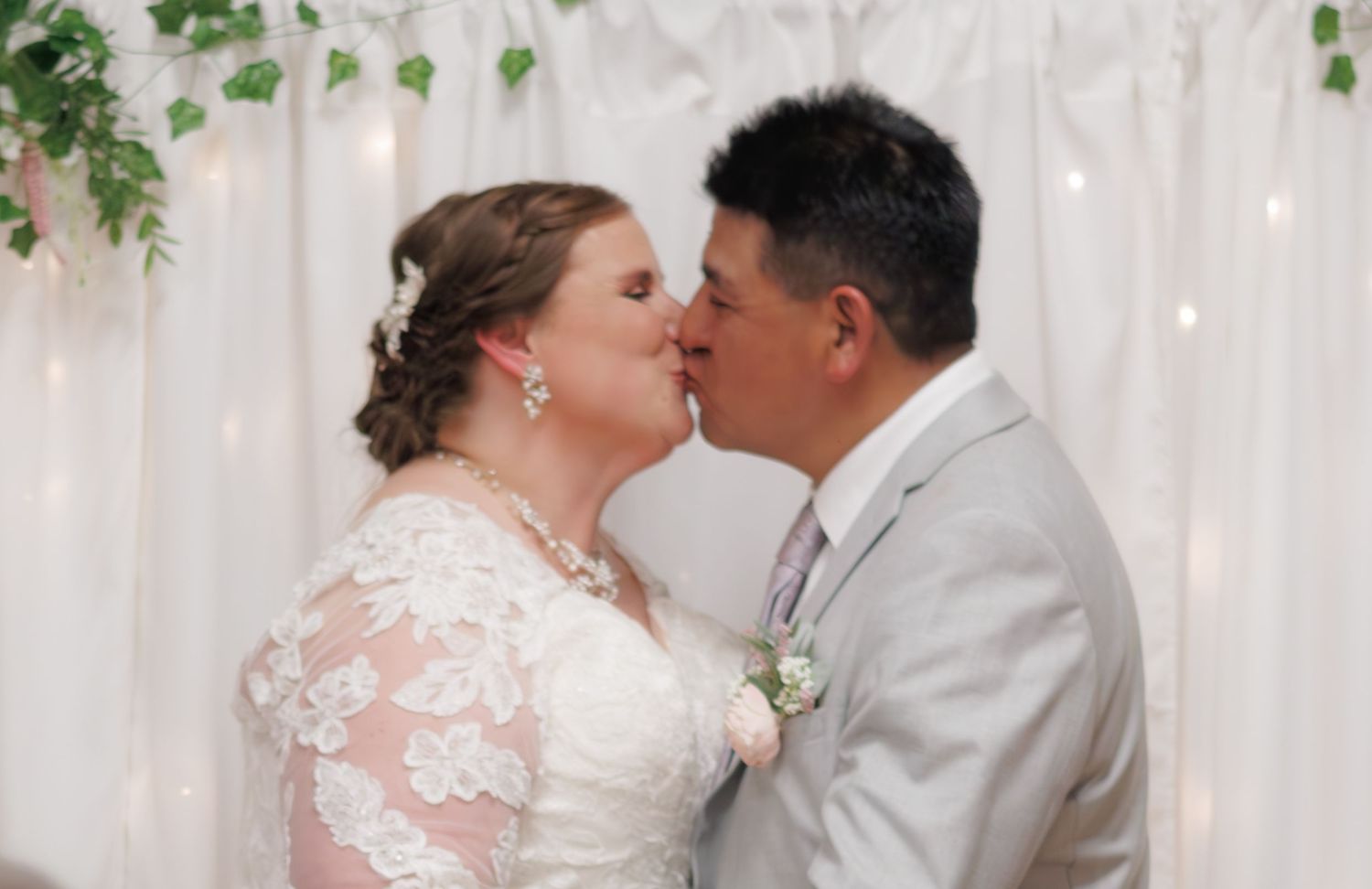 Romantic wedding photo collage showing tender moments between newlyweds against a white backdrop.