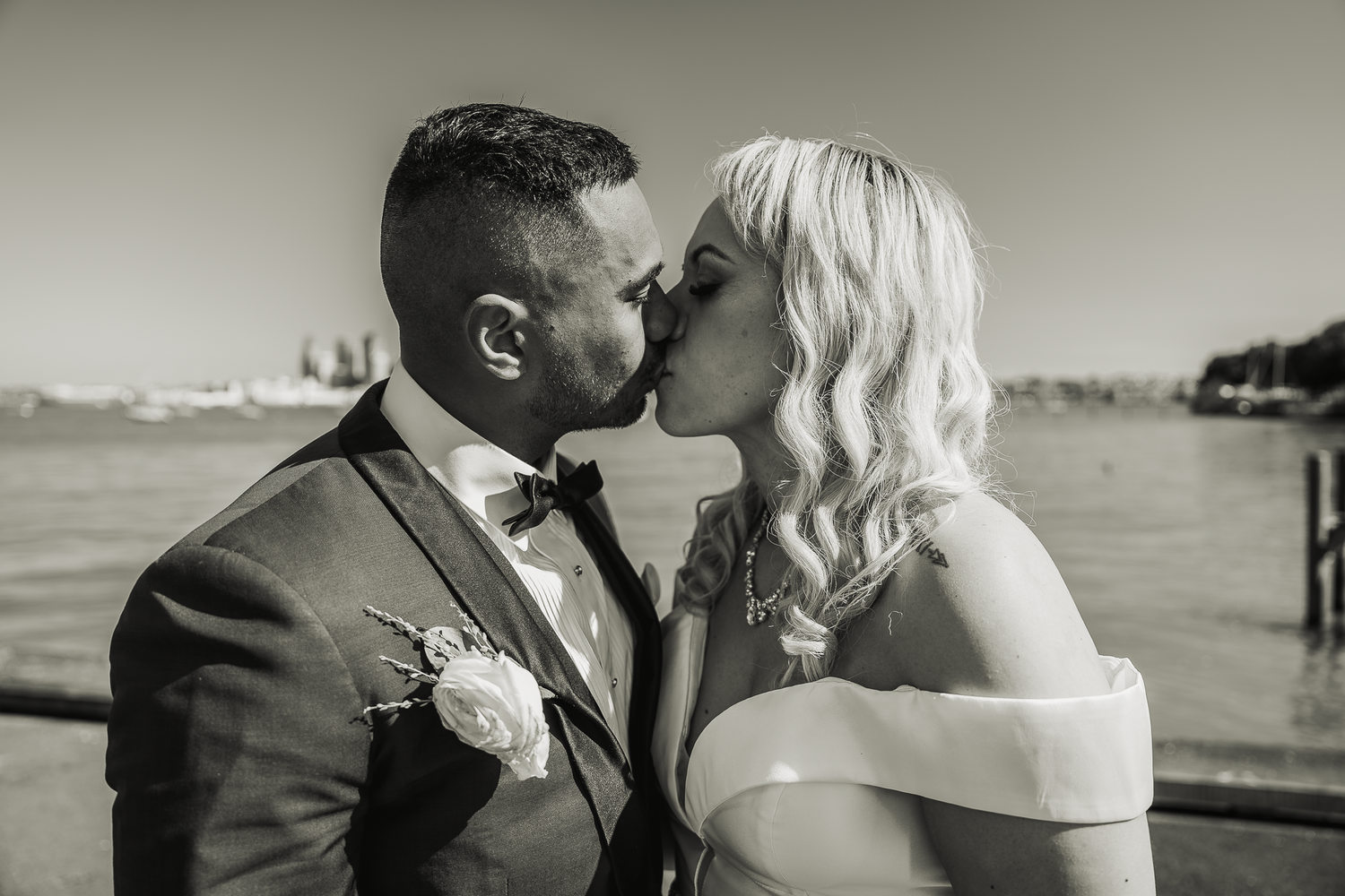 Black and white romantic waterfront wedding portrait in Seattle.