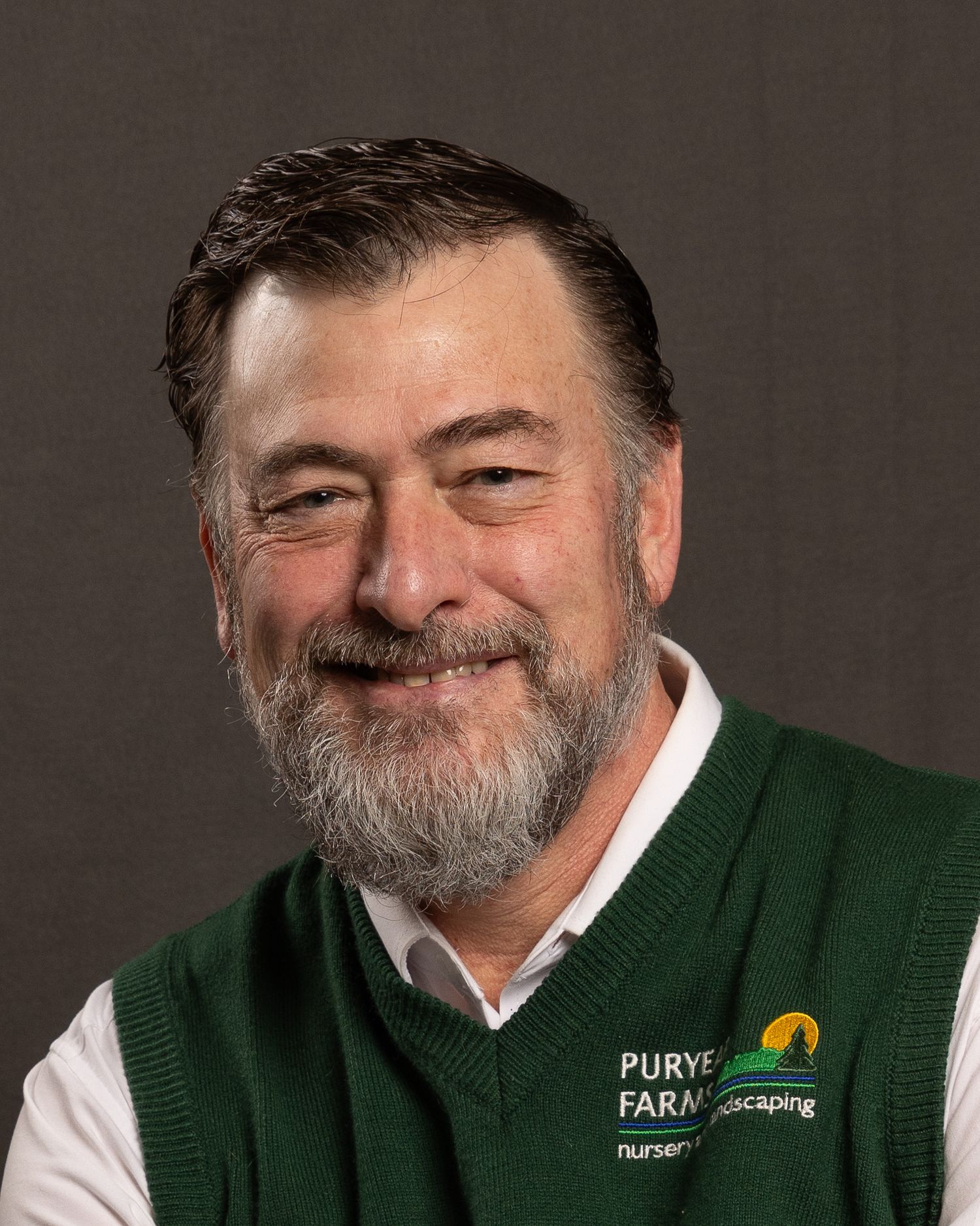 Owner of Puryear Farms, John Puryear, classic headshot, photographed with portable backdrop and lighting.